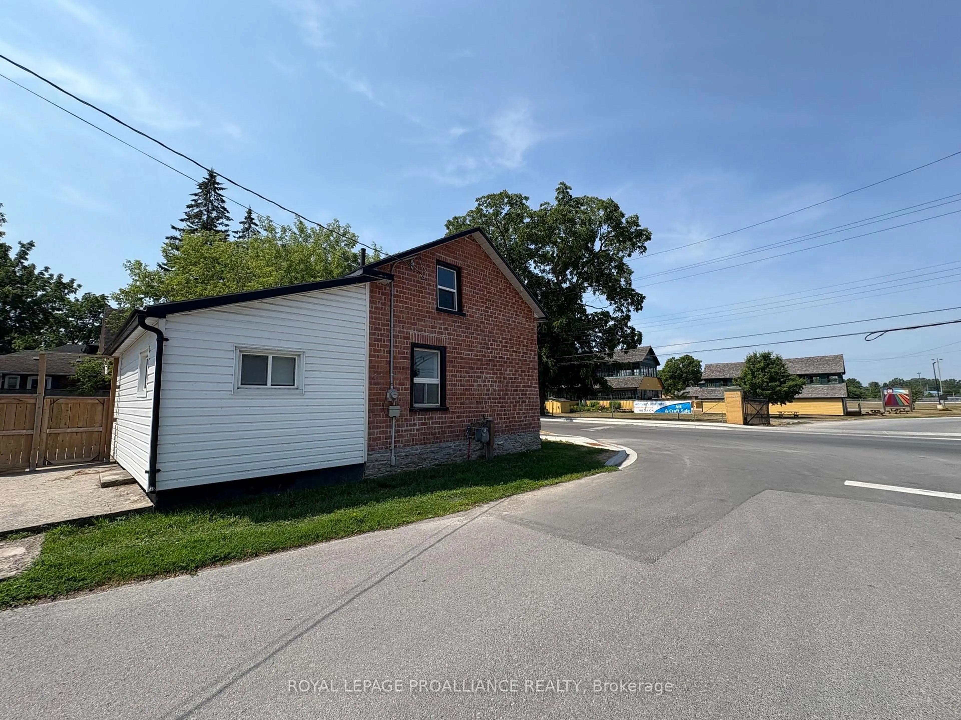 A pic from outside/outdoor area/front of a property/back of a property/a pic from drone, street for 374 Main St, Prince Edward County Ontario K0K 2T0