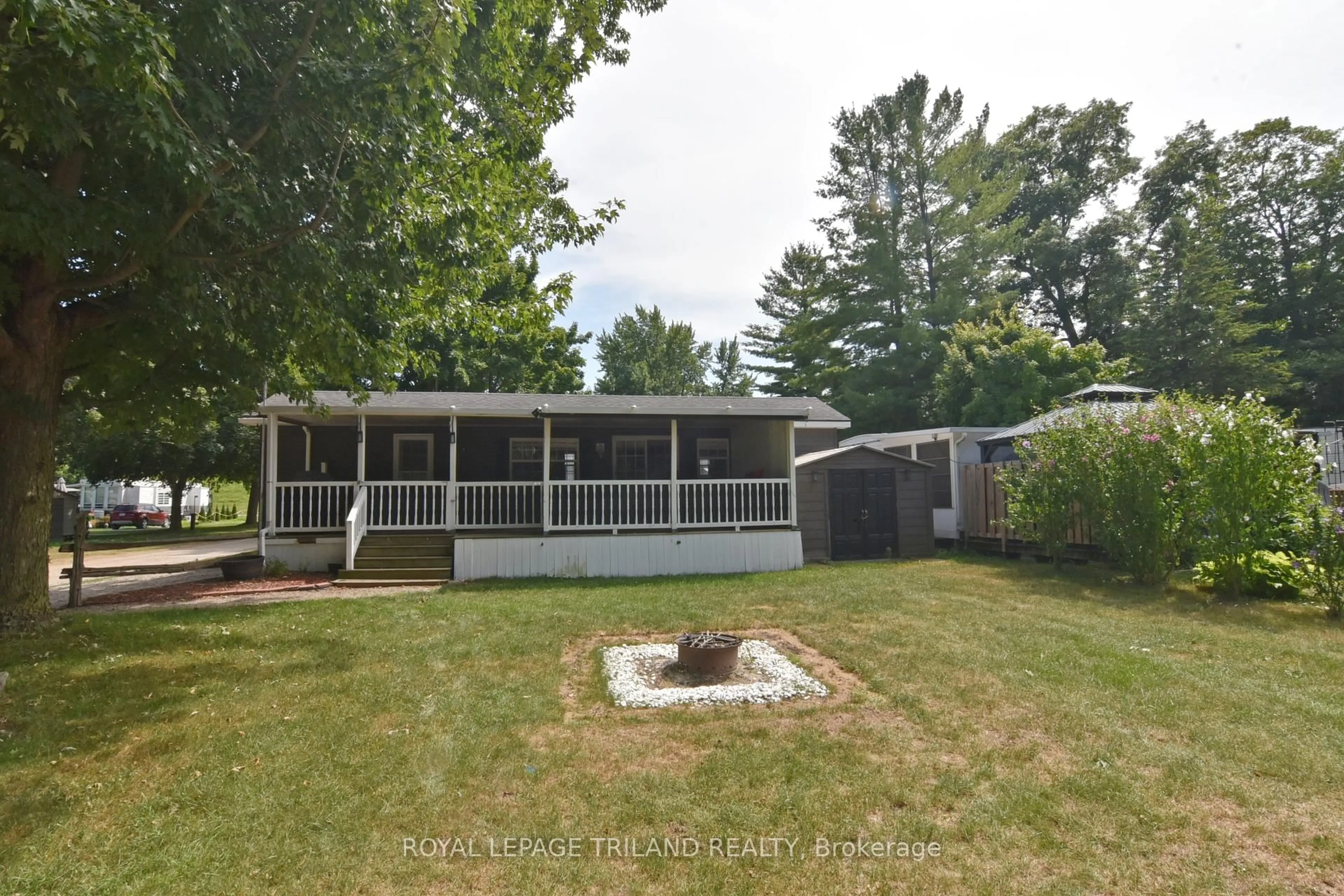 Home with vinyl exterior material, street for 9338 West Ipperwash Rd #G34, Lambton Shores Ontario N0N 1J0