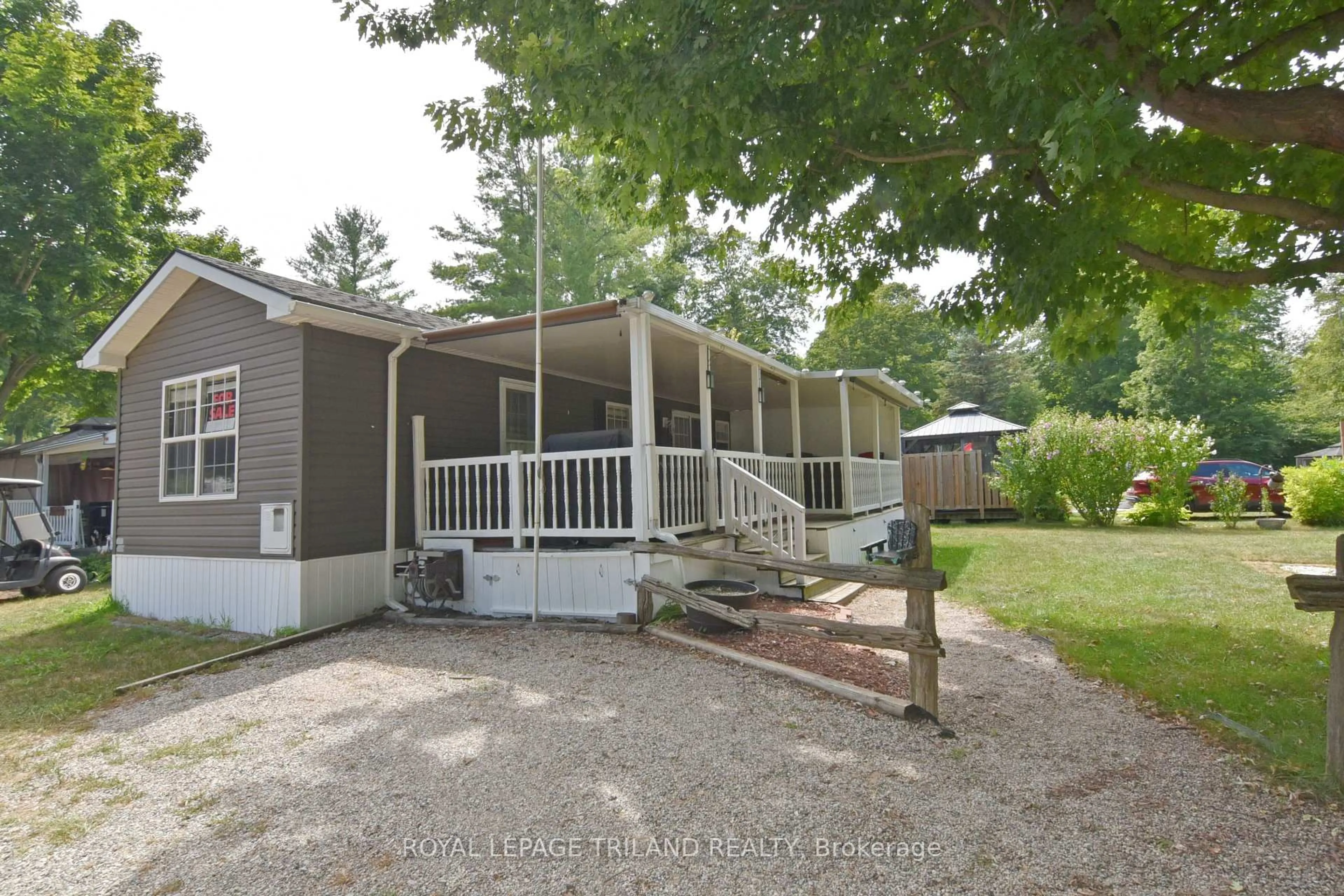 Home with vinyl exterior material, street for 9338 West Ipperwash Rd #G34, Lambton Shores Ontario N0N 1J0