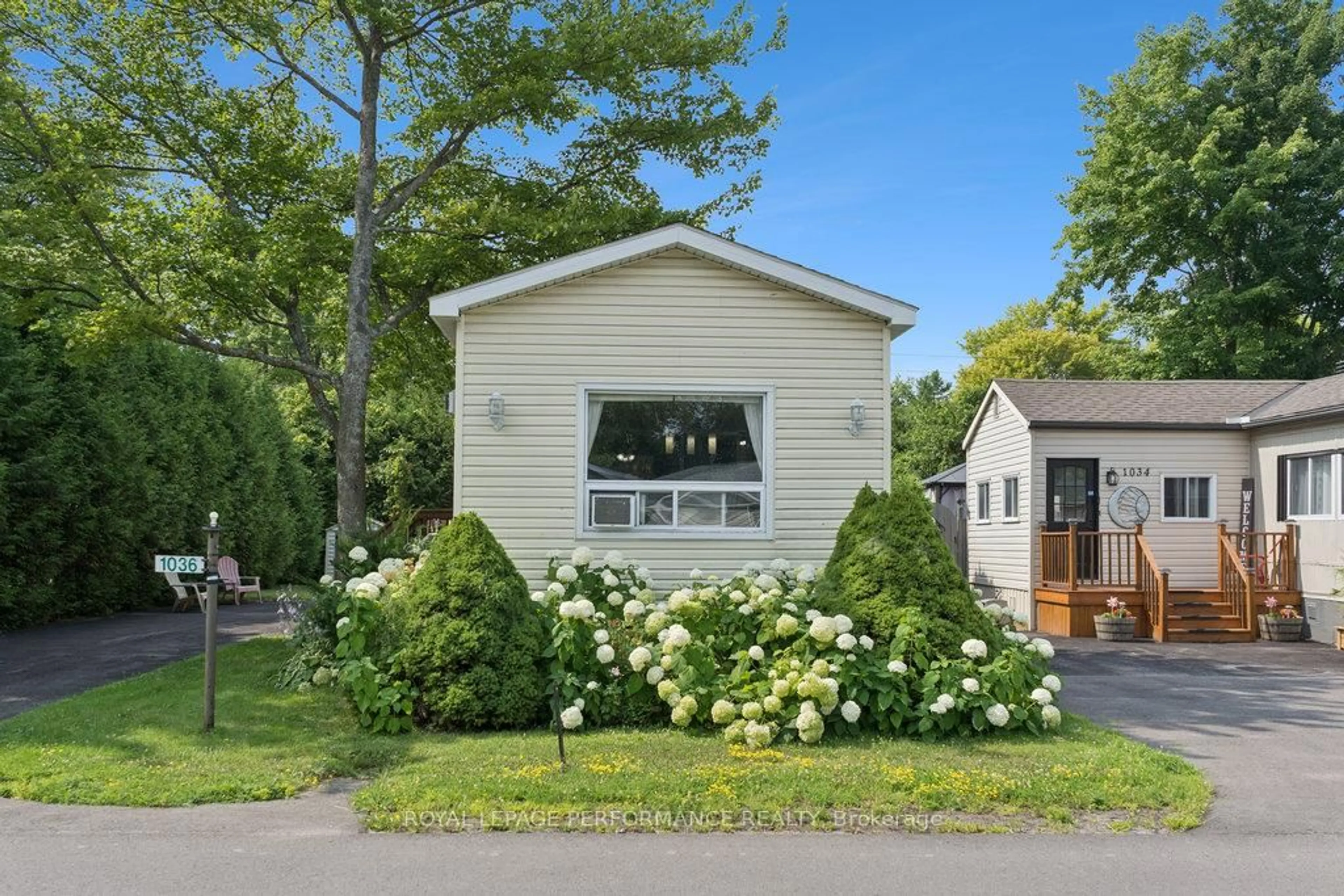 Home with vinyl exterior material, street for 1036 Vista Barrett Private, Greely Ontario K4P 1C7