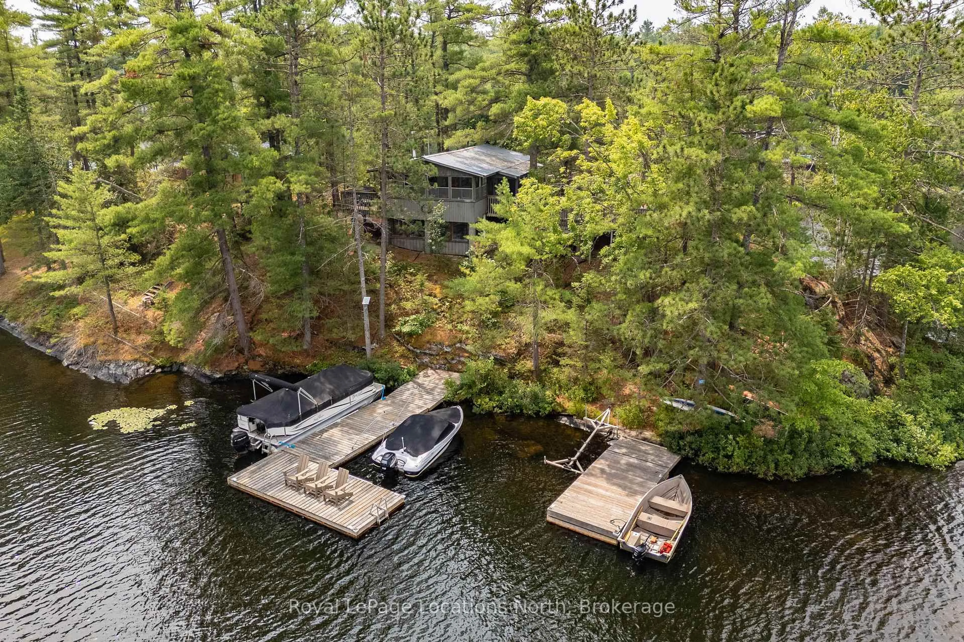 A pic from outside/outdoor area/front of a property/back of a property/a pic from drone, water/lake/river/ocean view for 2 3LN Berkinshaw Island, Gravenhurst Ontario P1P 1R2