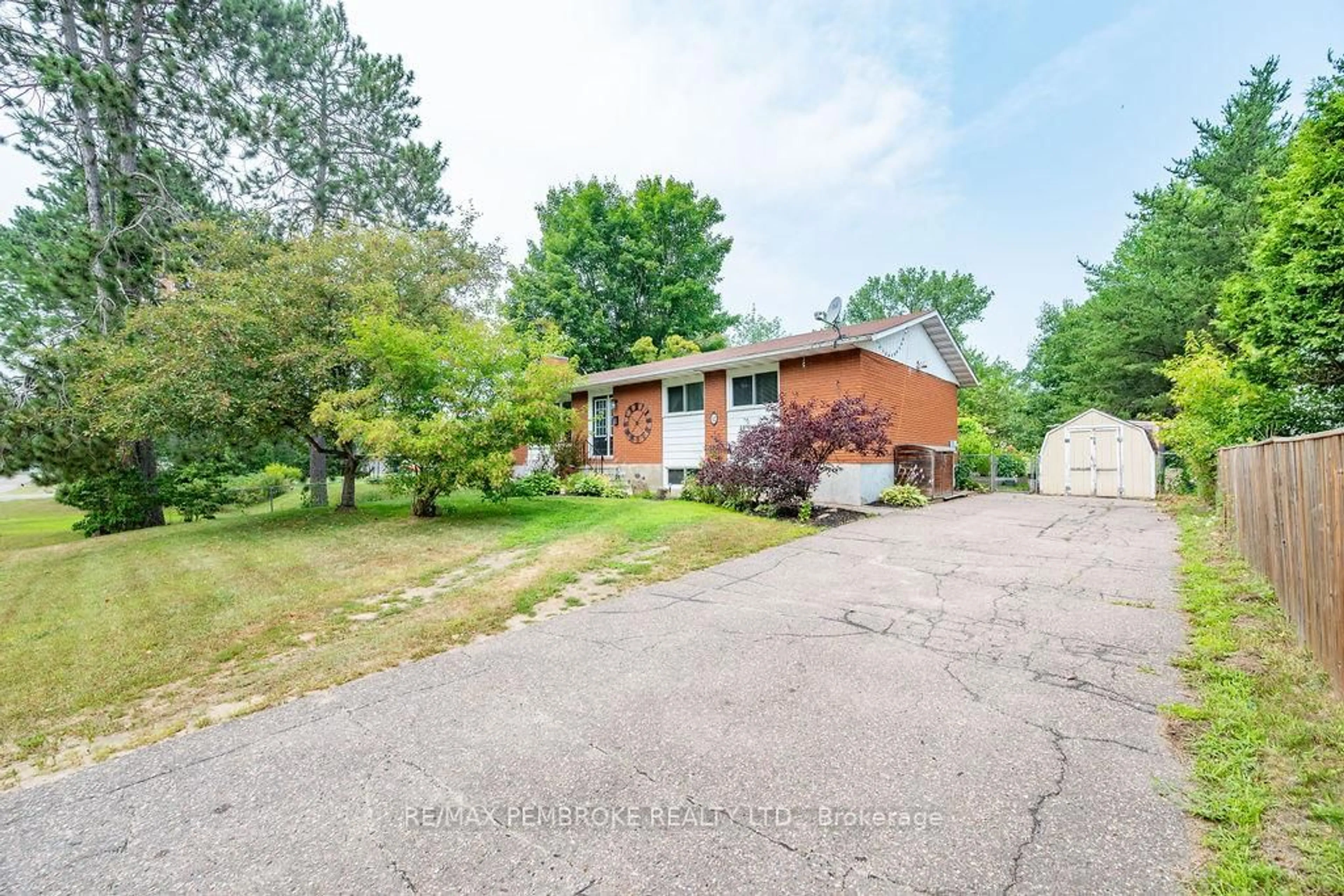A pic from outside/outdoor area/front of a property/back of a property/a pic from drone, street for 12 Roy St, Petawawa Ontario K8H 3A6