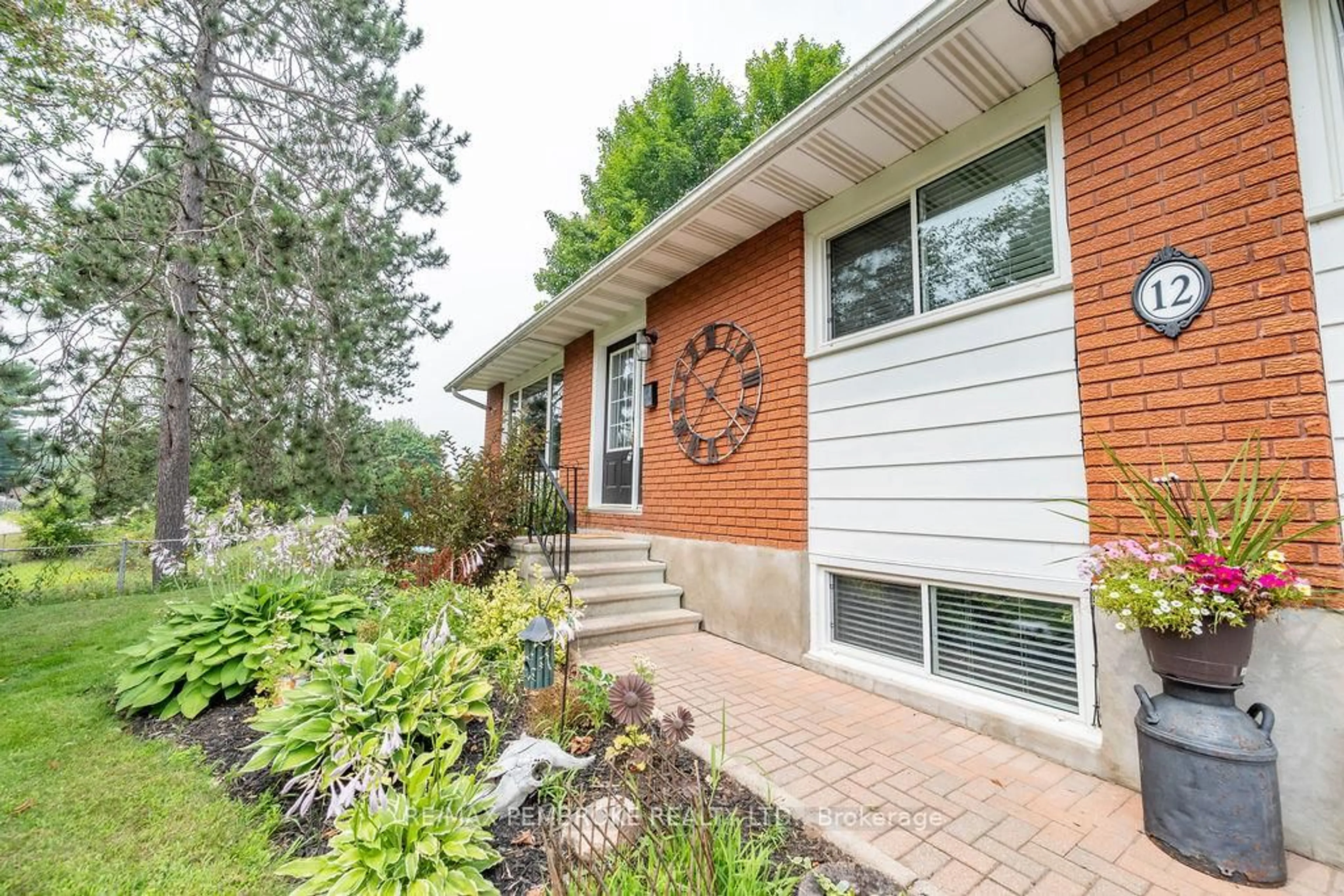 Home with brick exterior material, street for 12 Roy St, Petawawa Ontario K8H 3A6