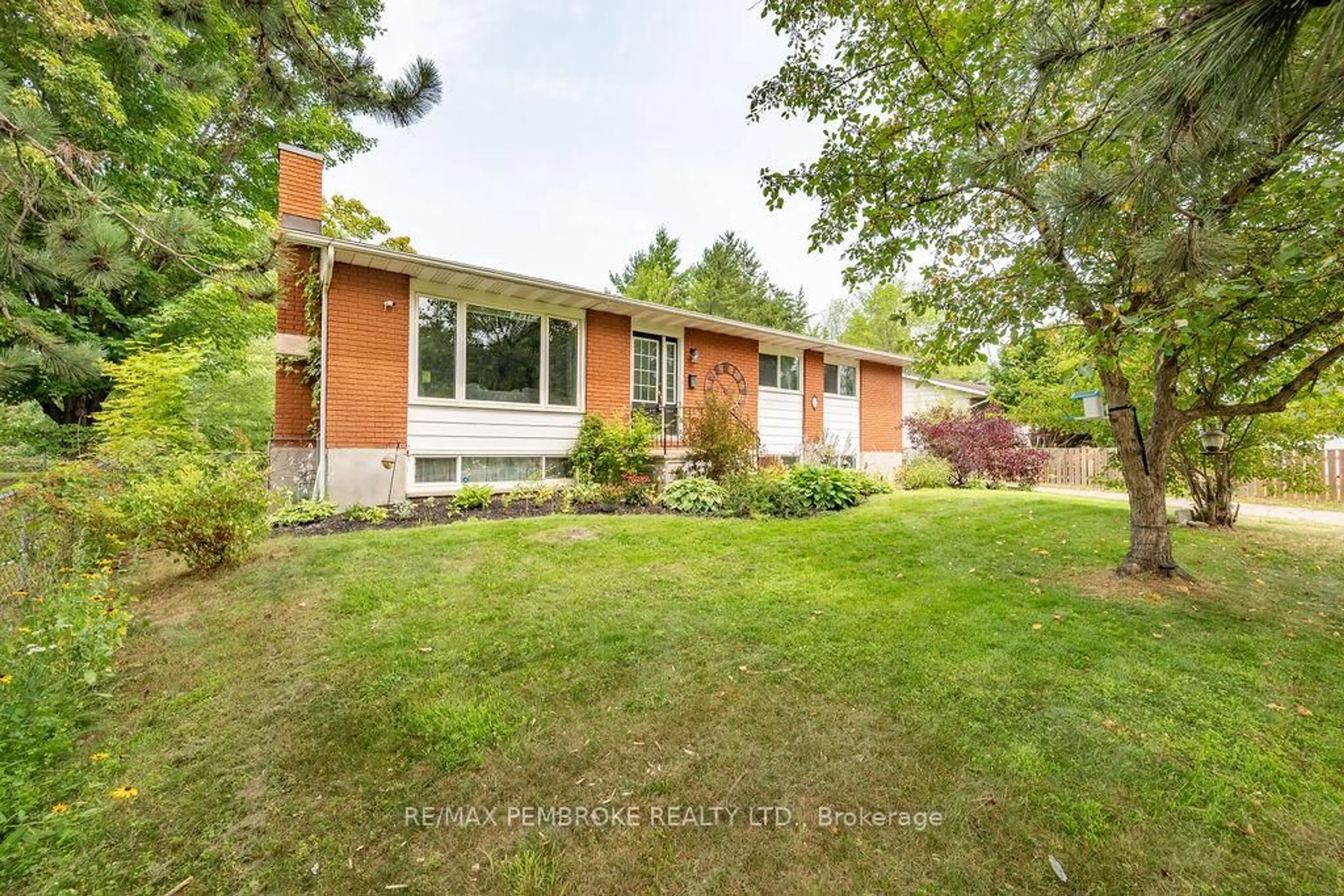 Home with brick exterior material, street for 12 Roy St, Petawawa Ontario K8H 3A6