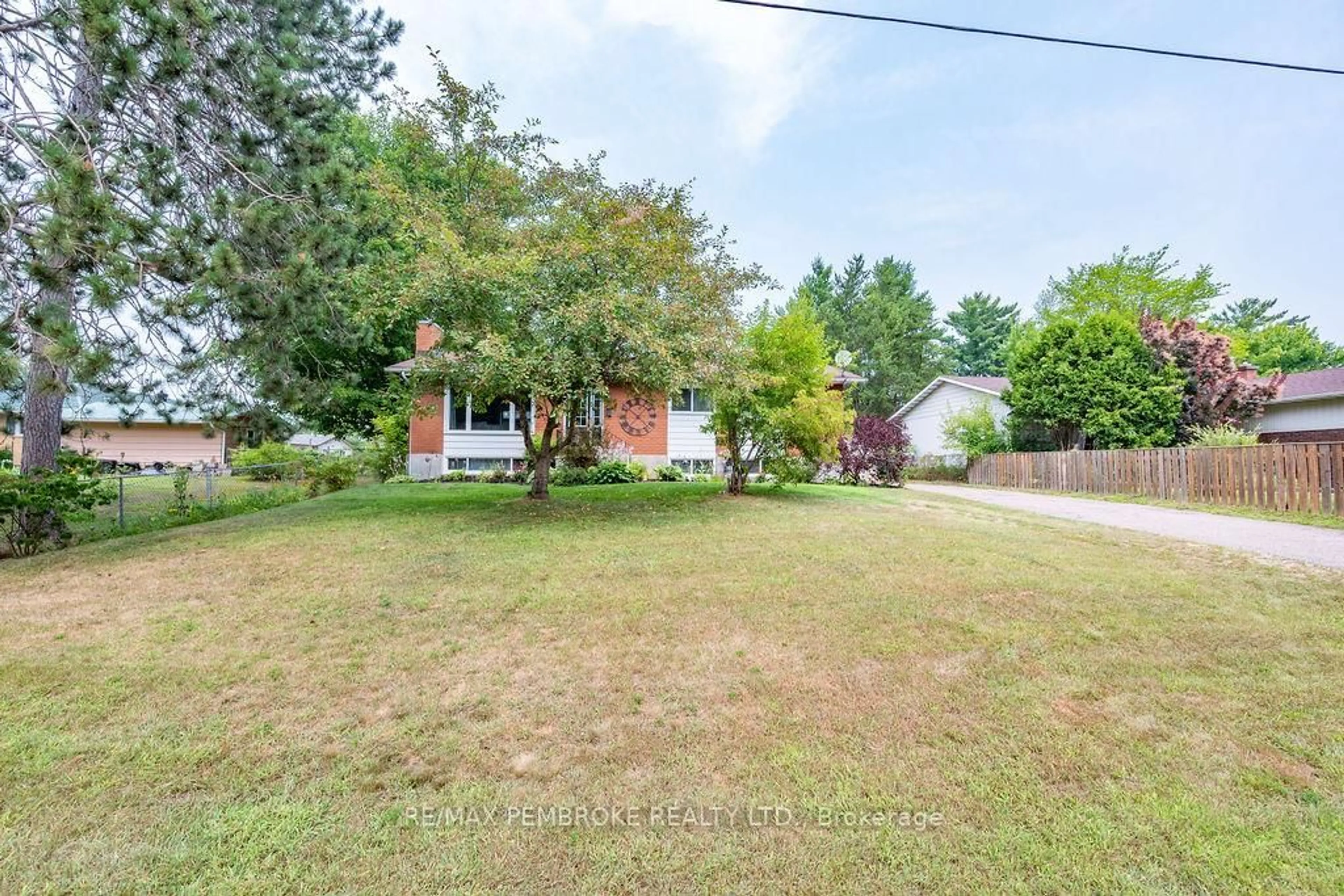 A pic from outside/outdoor area/front of a property/back of a property/a pic from drone, street for 12 Roy St, Petawawa Ontario K8H 3A6