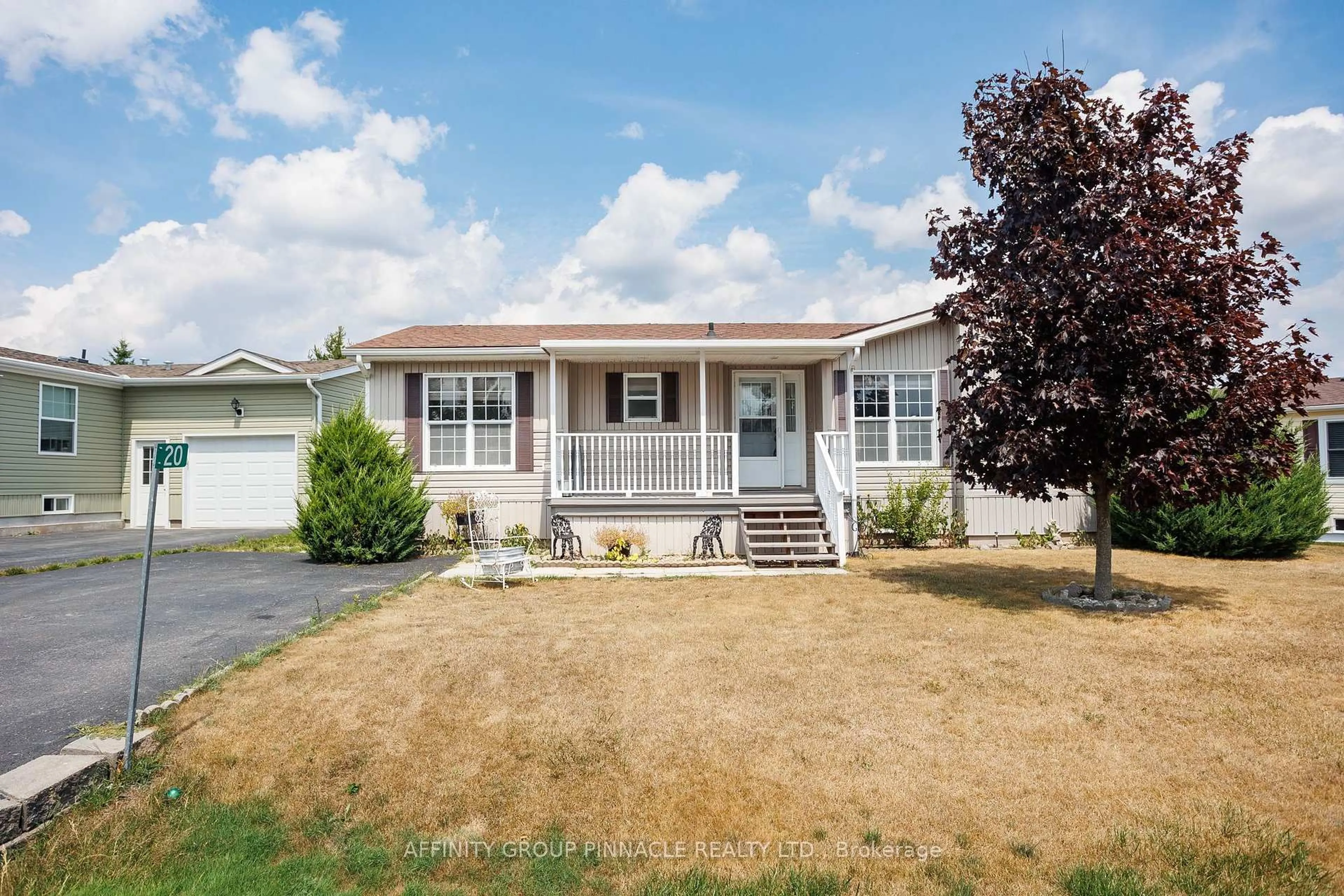 Home with vinyl exterior material, street for 20 Creekside Circ, Kawartha Lakes Ontario K0M 1L0