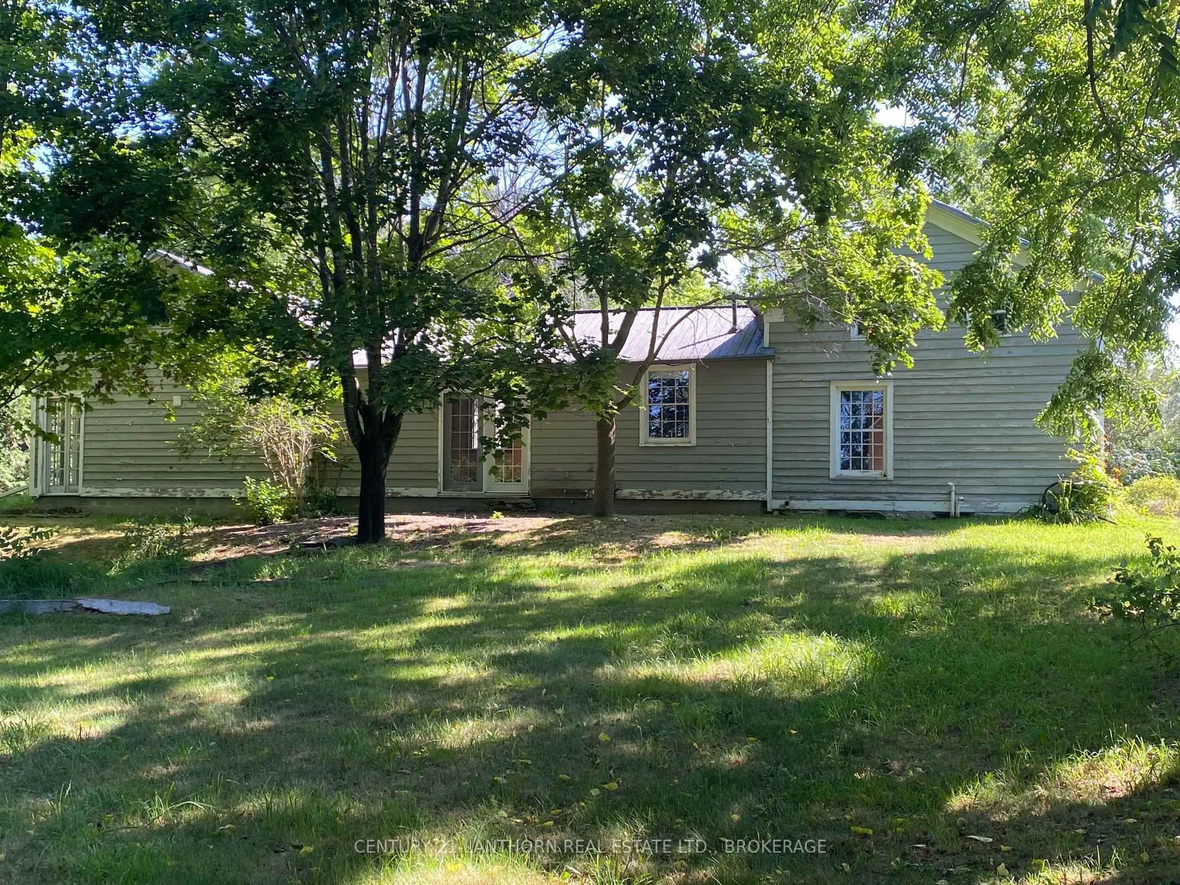 A pic from outside/outdoor area/front of a property/back of a property/a pic from drone, street for 6419 County Road 2 Rd, Bissett Creek Ontario K0H 2H0