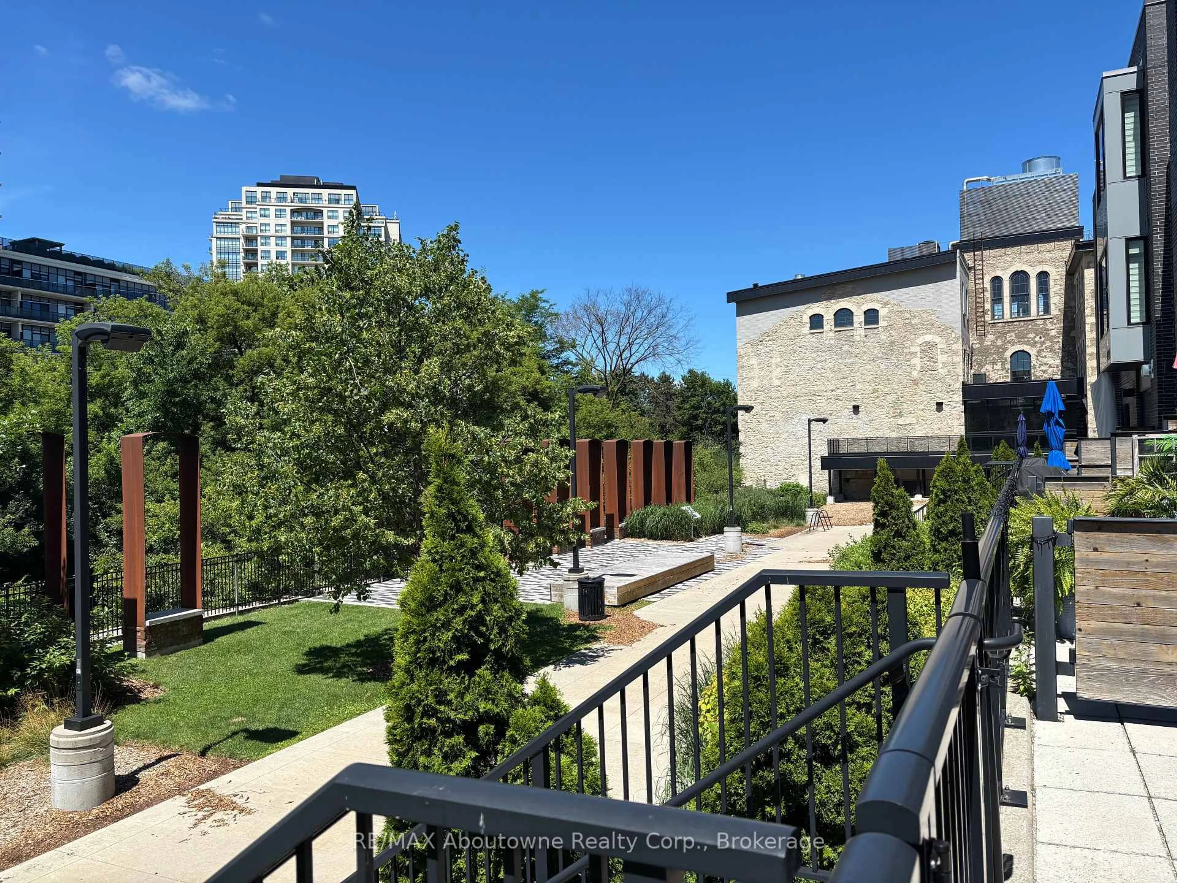 Patio, city buildings view from balcony for 53 Arthur St #RL5, Guelph Ontario N1E 0P5