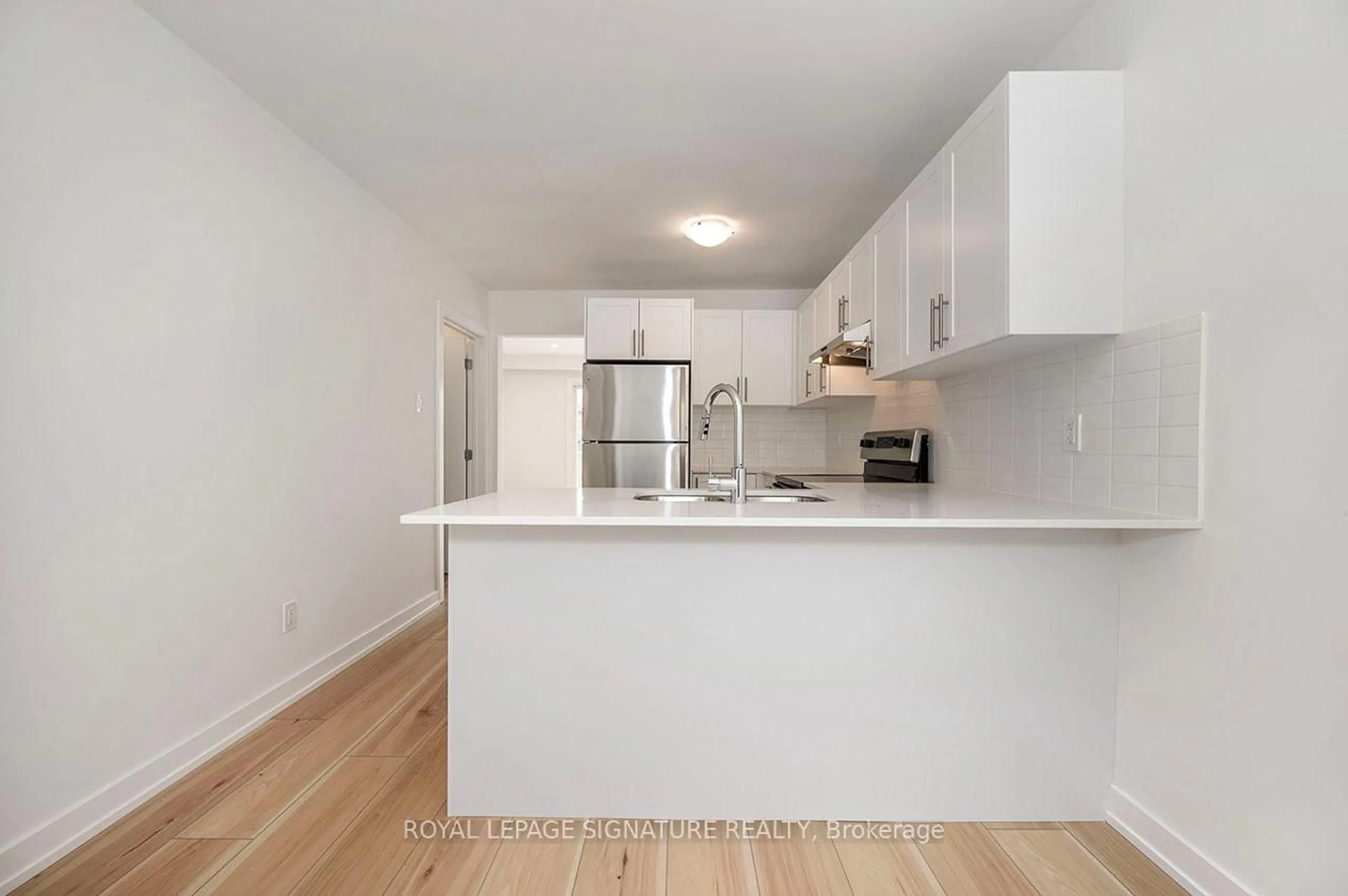 Standard kitchen, wood/laminate floor for 81 Woodman Dr, Hamilton Ontario L8H 2M5