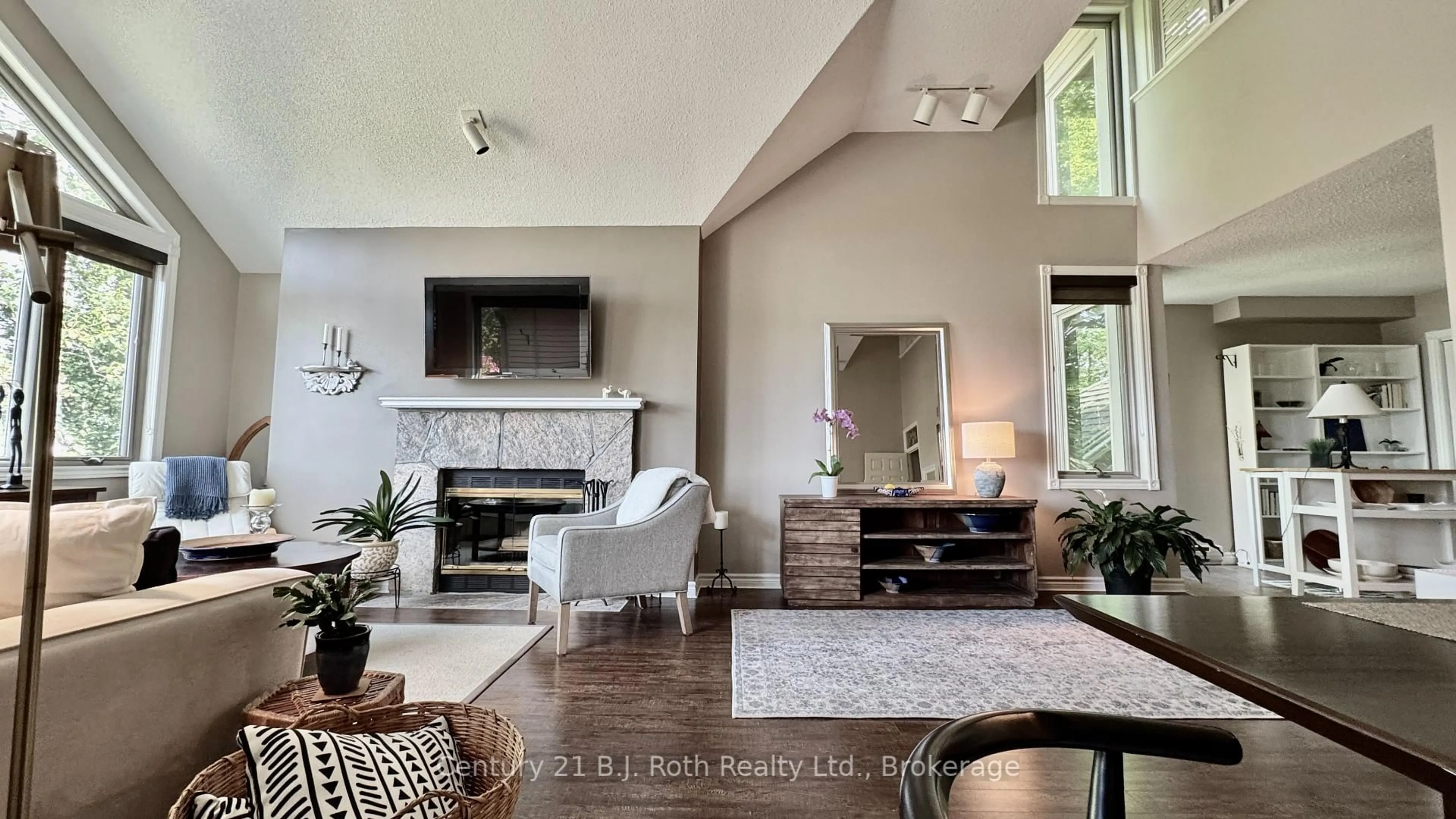 Living room with furniture, ceramic/tile floor for 331 Grandview Hilltop Dr, Huntsville Ontario P1H 2J5