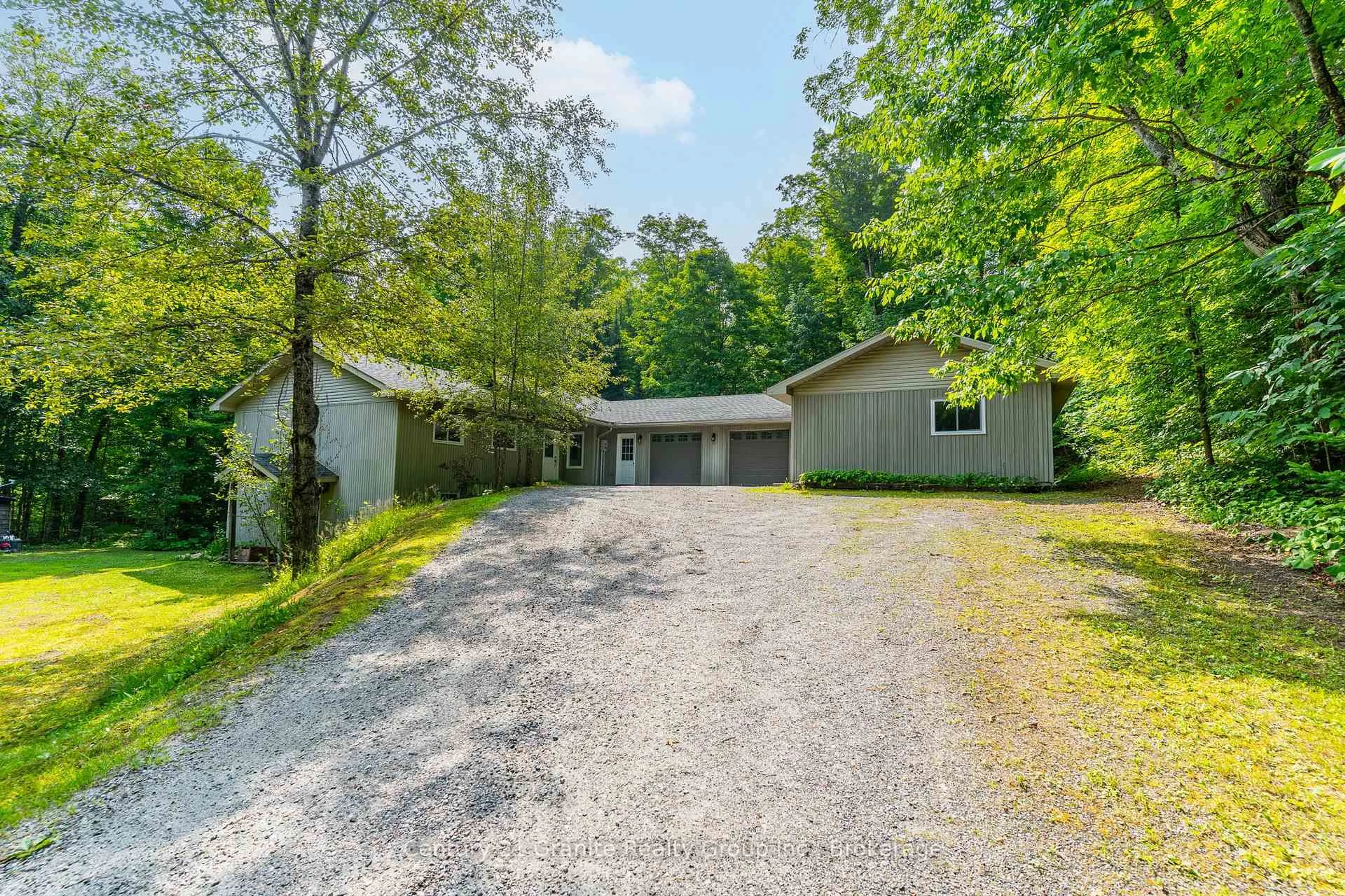 A pic from outside/outdoor area/front of a property/back of a property/a pic from drone, unknown for 1029 Wigamog Rd, Minden Hills Ontario K0M 1S0