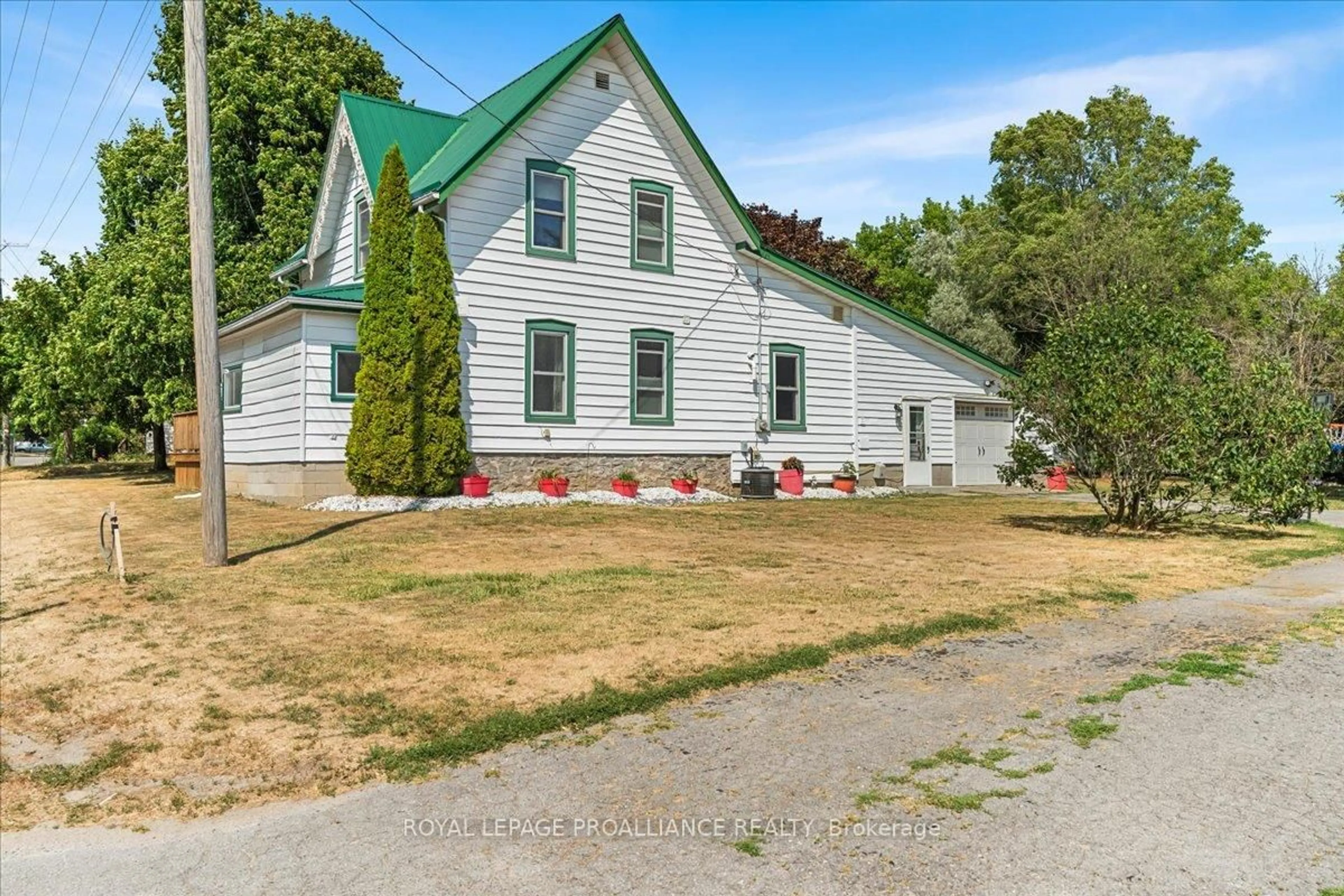 A pic from outside/outdoor area/front of a property/back of a property/a pic from drone, street for 1436 County Road 15, Prince Edward County Ontario K0K 2T0