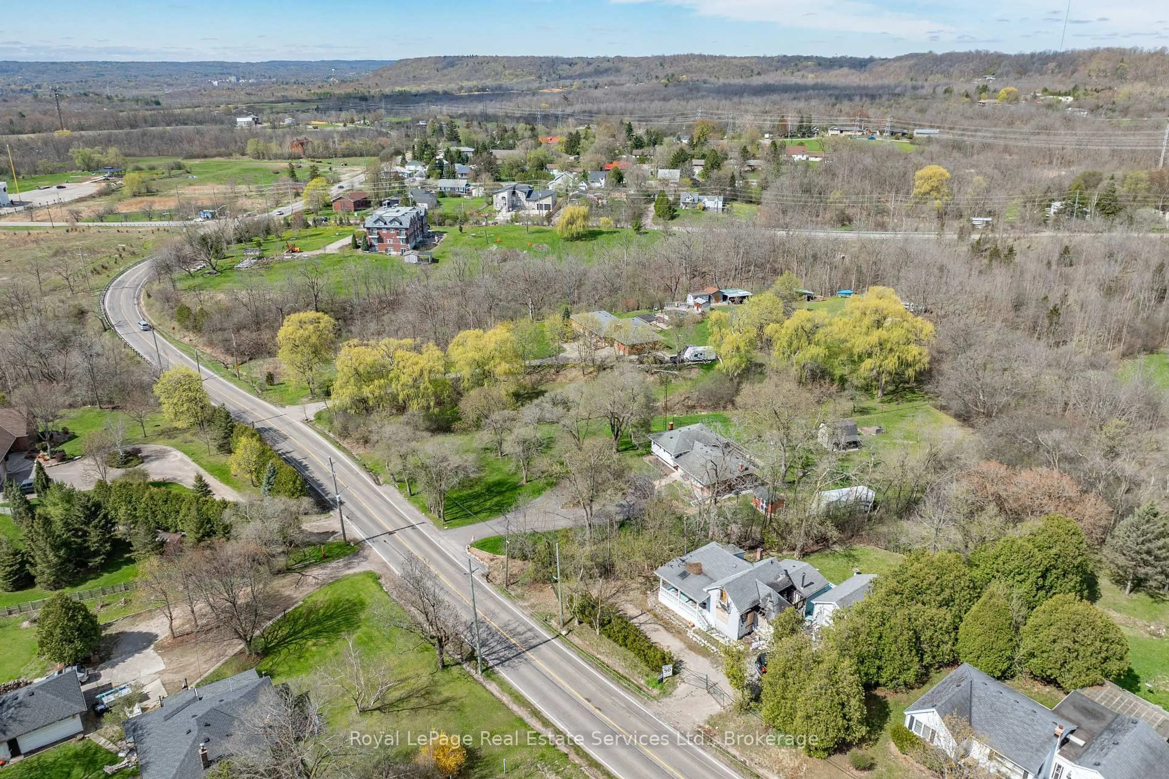 A pic from outside/outdoor area/front of a property/back of a property/a pic from drone, street for 701 York Rd, Hamilton Ontario L9H 5W9