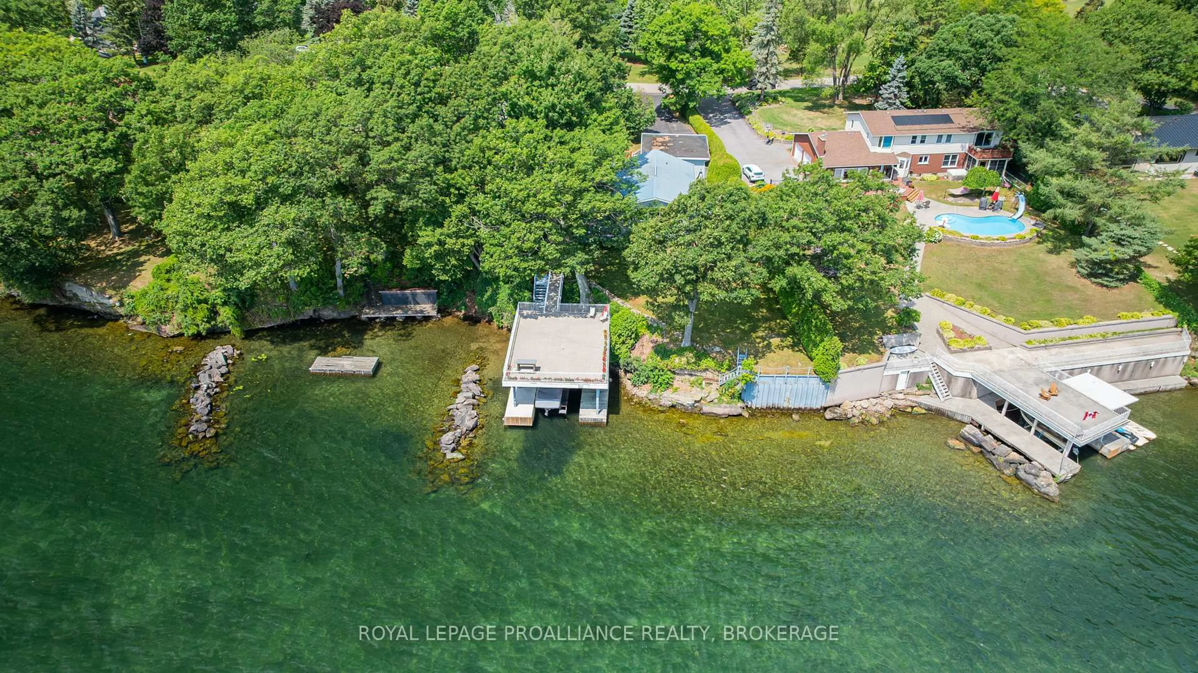 A pic from outside/outdoor area/front of a property/back of a property/a pic from drone, water/lake/river/ocean view for 16 Jack Straw Lane, Gananoque Ontario K7G 2V4