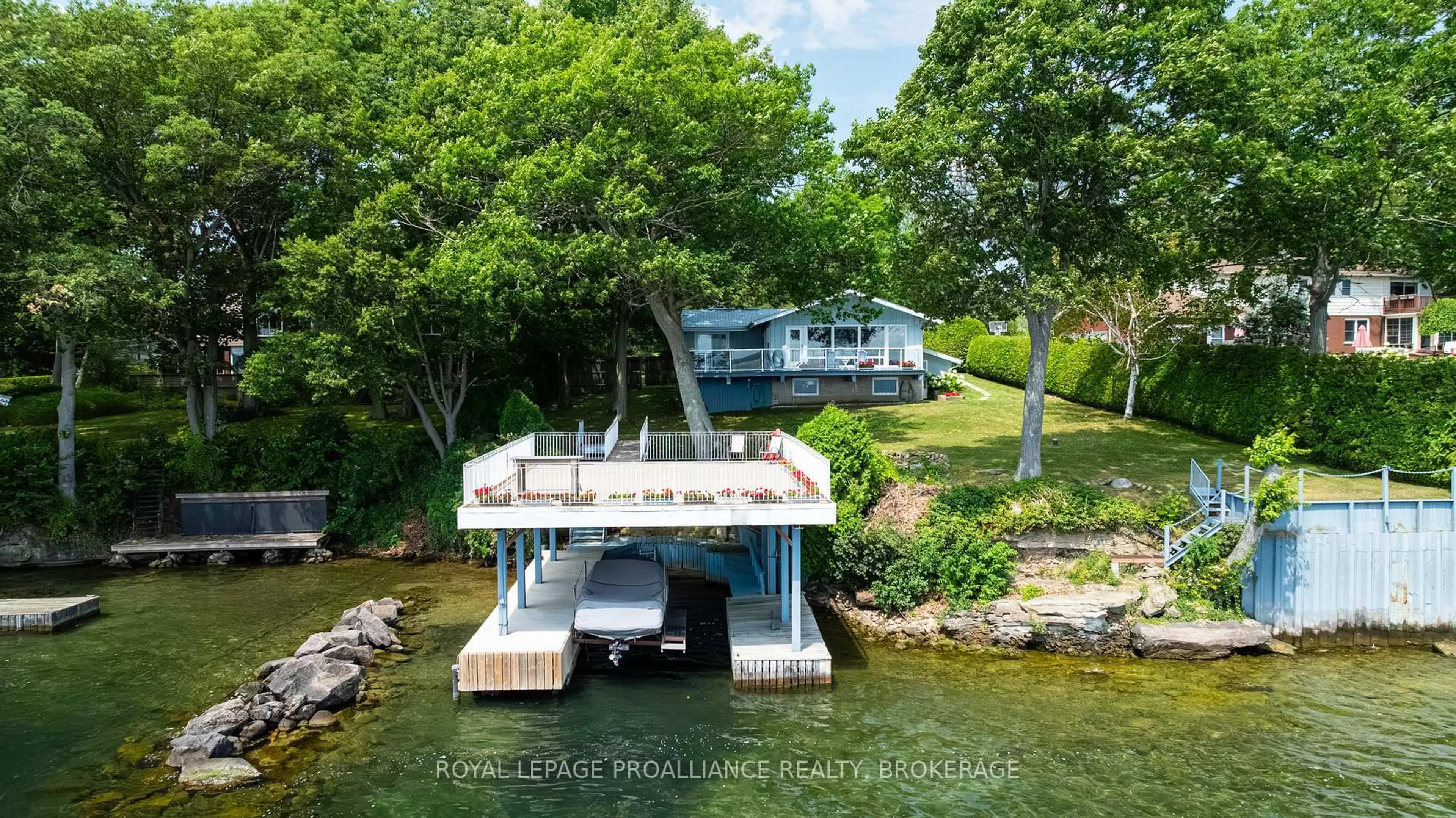 A pic from outside/outdoor area/front of a property/back of a property/a pic from drone, water/lake/river/ocean view for 16 Jack Straw Lane, Gananoque Ontario K7G 2V4