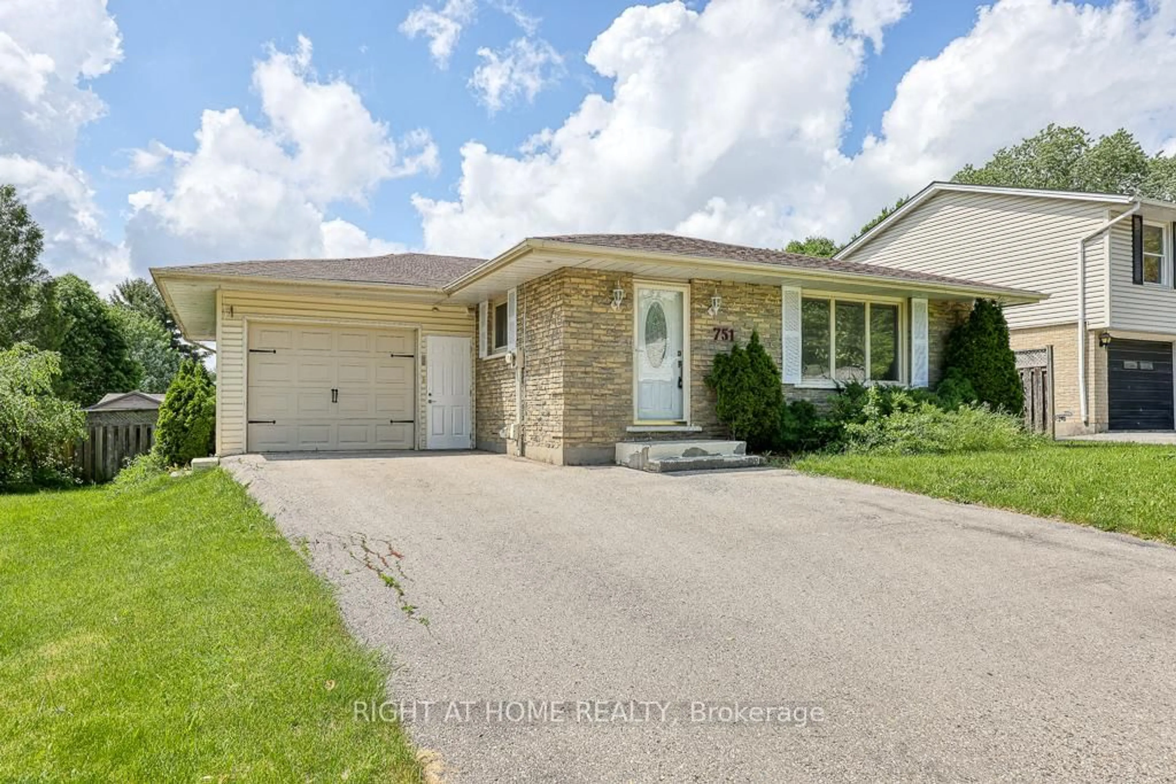 Home with brick exterior material, street for 751 BOYLE Dr, Woodstock Ontario N4S 8M1