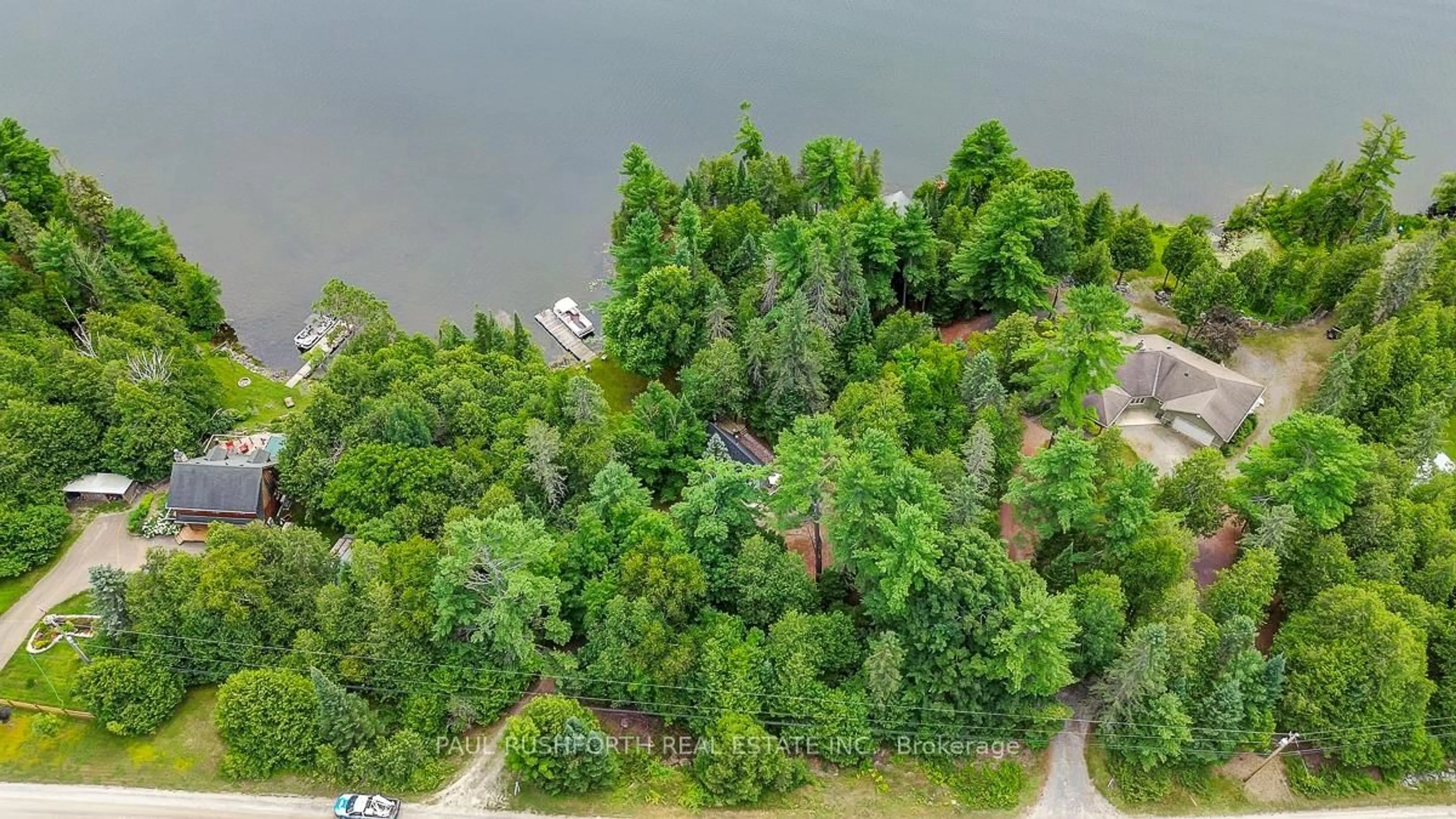 A pic from outside/outdoor area/front of a property/back of a property/a pic from drone, water/lake/river/ocean view for 1459 Peneshula Rd, White Lake Ontario K0A 3L0