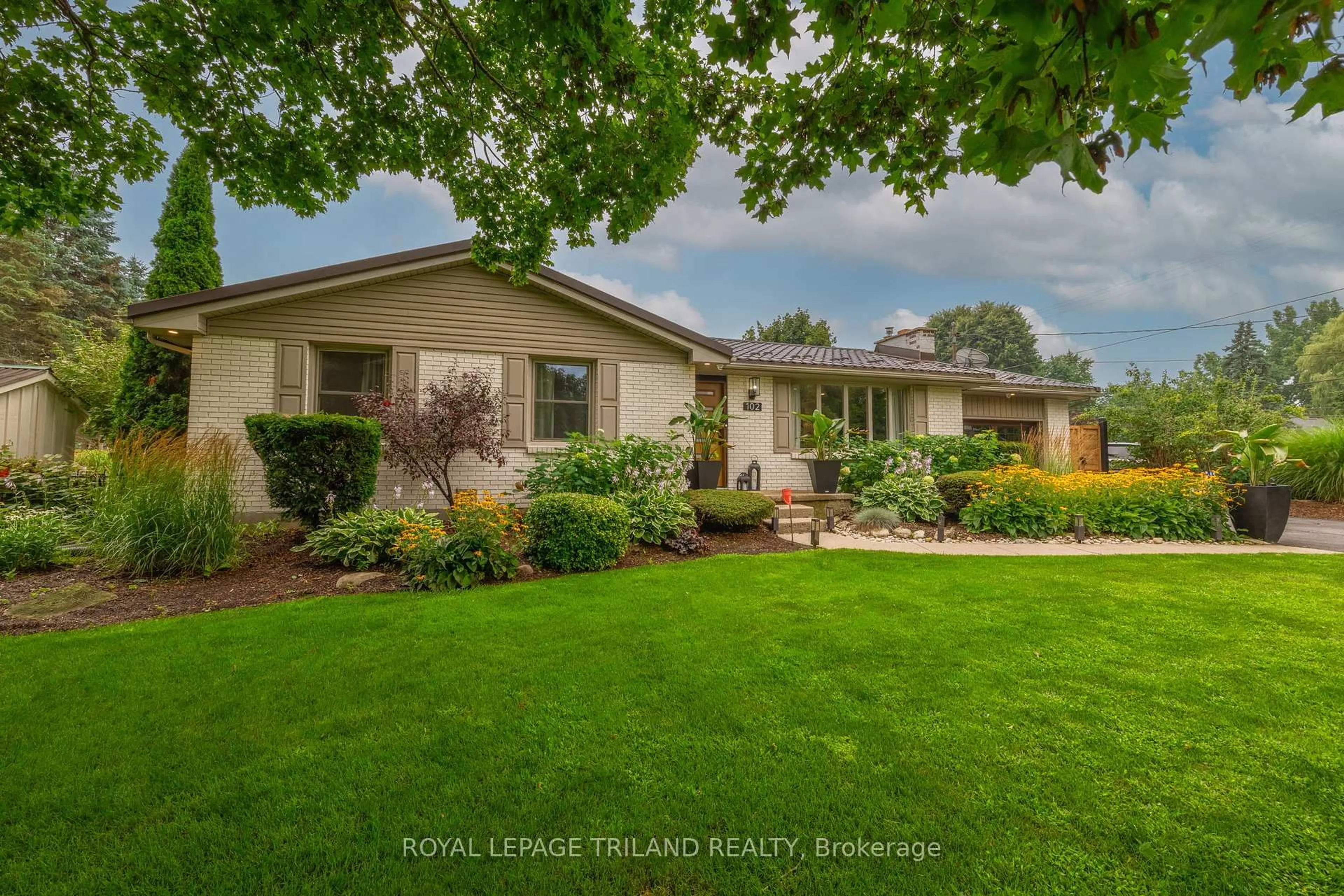 Home with vinyl exterior material, street for 102 RAILWAY Ave, Middlesex Centre Ontario N0L 1R0