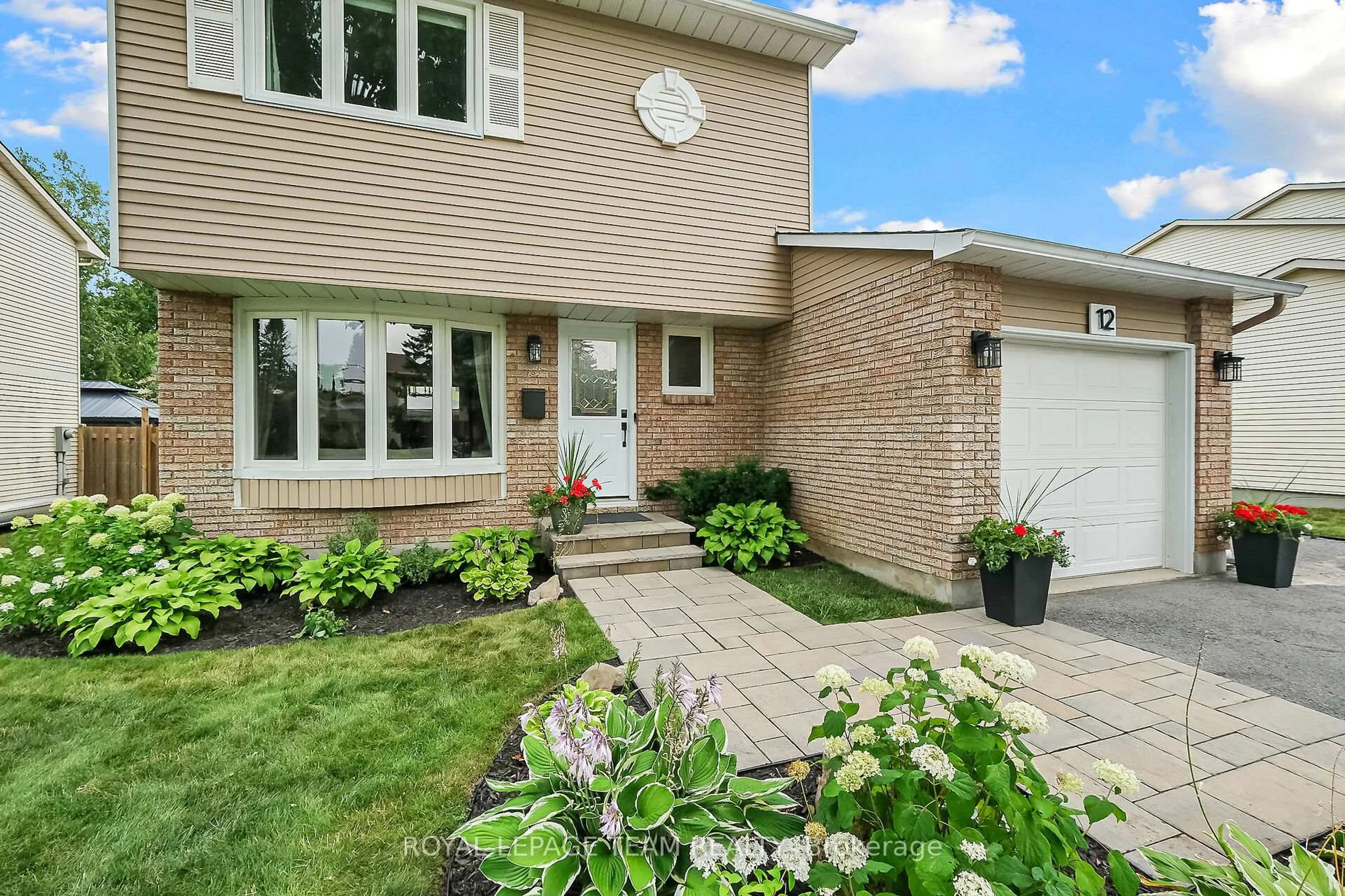 Home with brick exterior material, street for 12 Bartley Cres Cres, Ottawa Ontario K2J 2J7