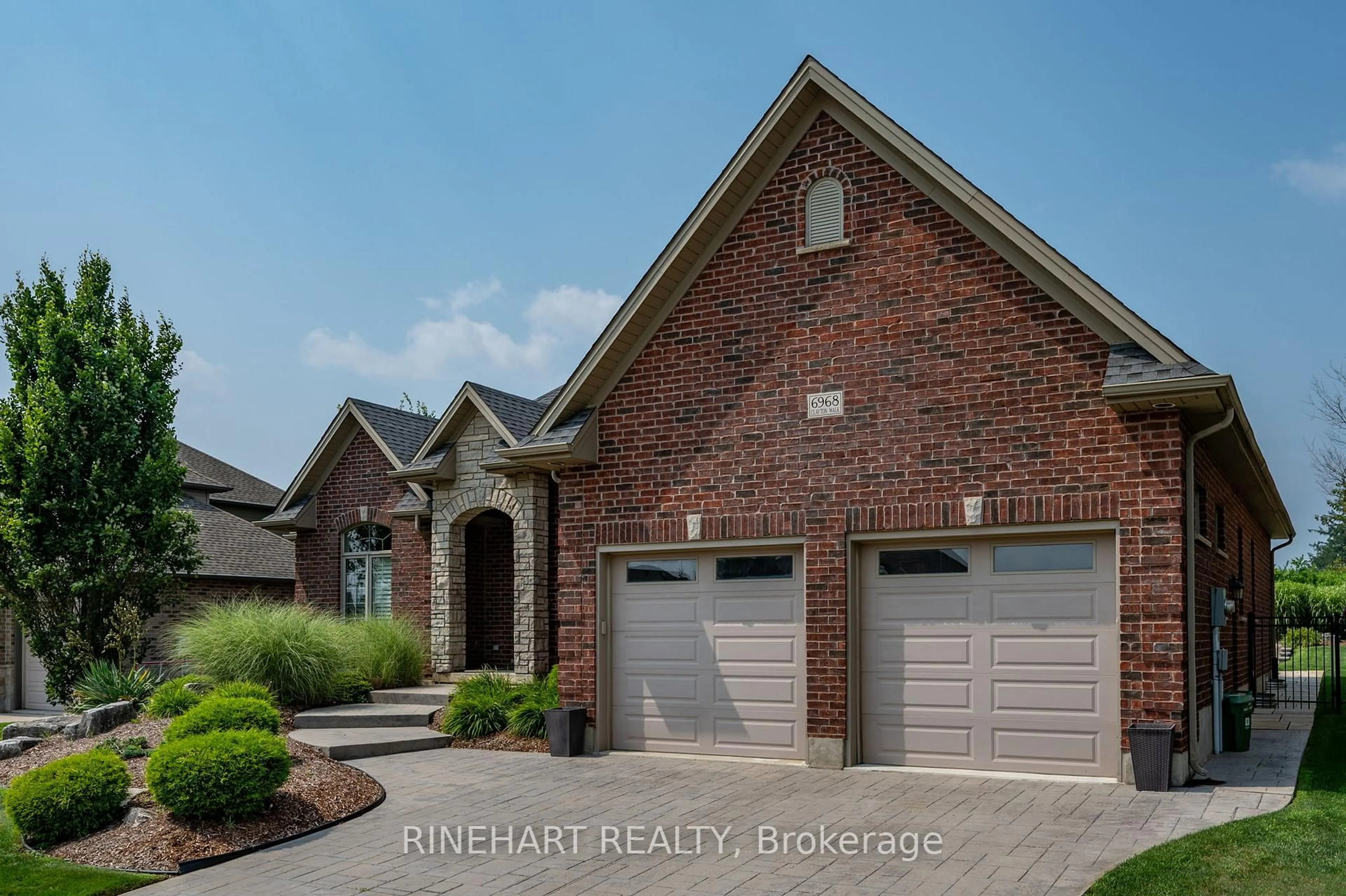 Home with brick exterior material, street for 6968 Clayton Walk, London South Ontario N6P 0B2