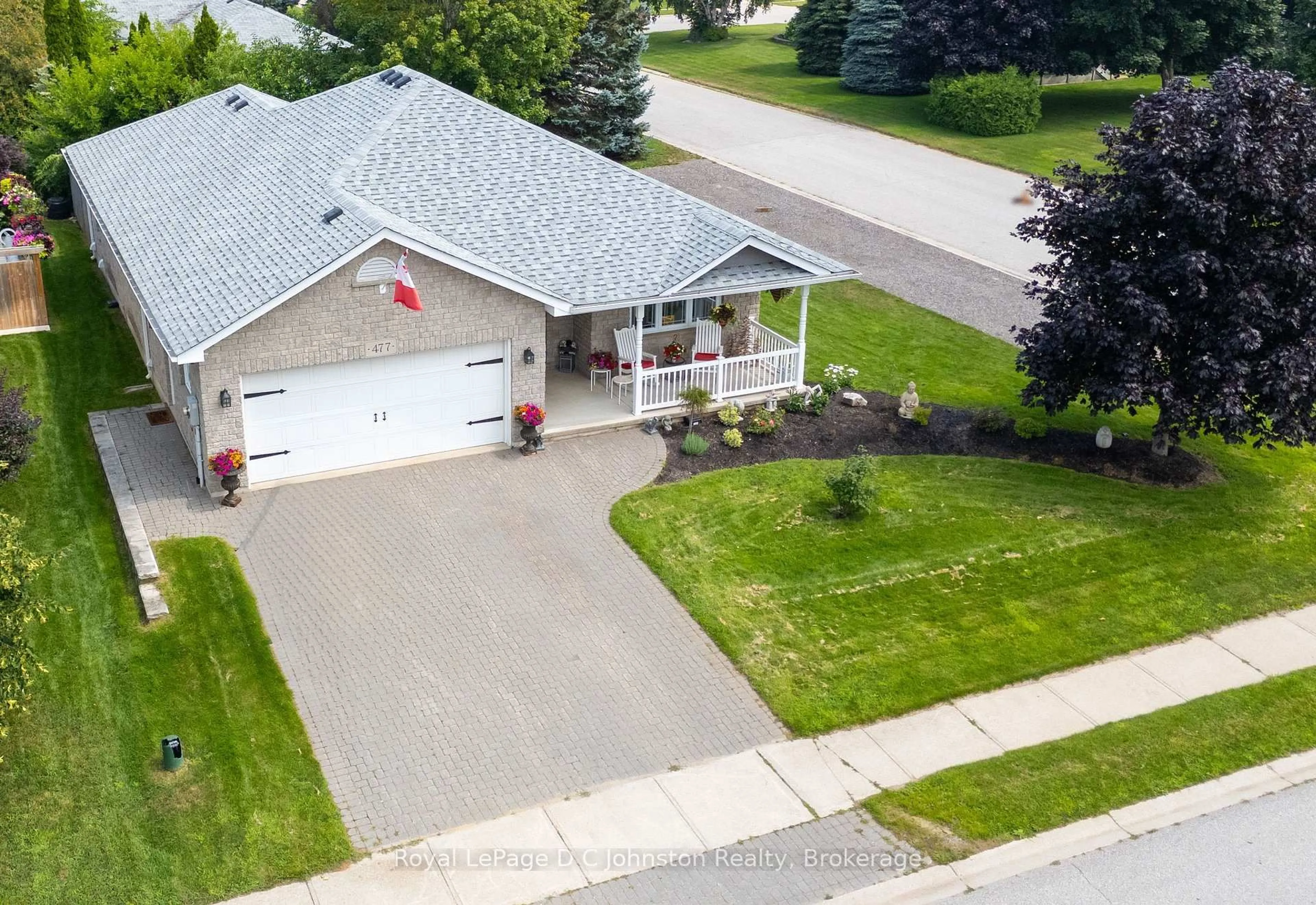A pic from outside/outdoor area/front of a property/back of a property/a pic from drone, street for 477 Buckby Lane, Saugeen Shores Ontario N0H 2C1