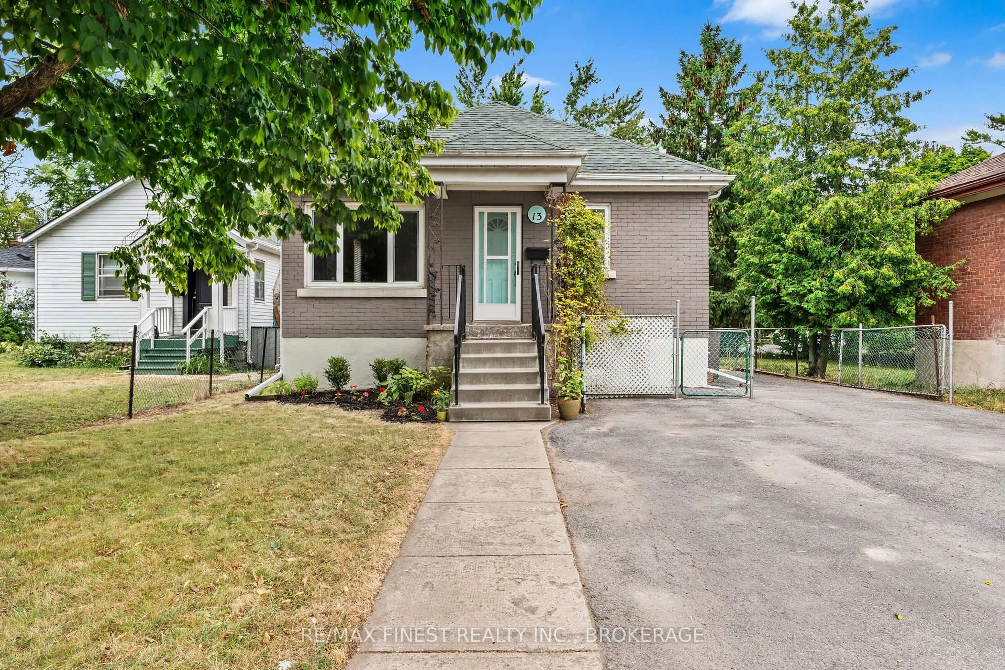 Home with brick exterior material, street for 13 Scott St, Kingston Ontario K7L 1L3