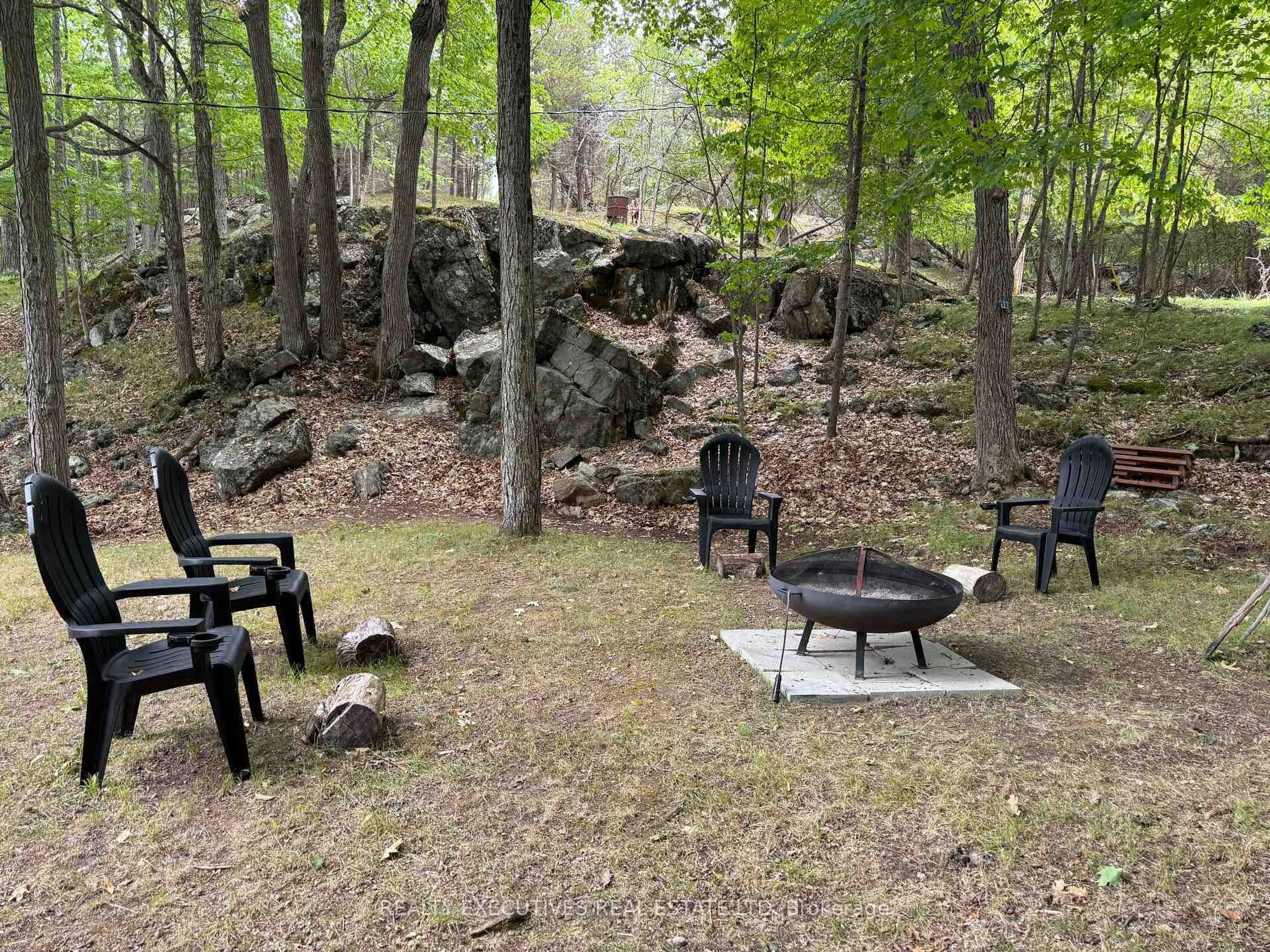 Patio, forest/trees view for 21 Sand-Birch Isl Island, Rideau Lakes Ontario K0G 1E0