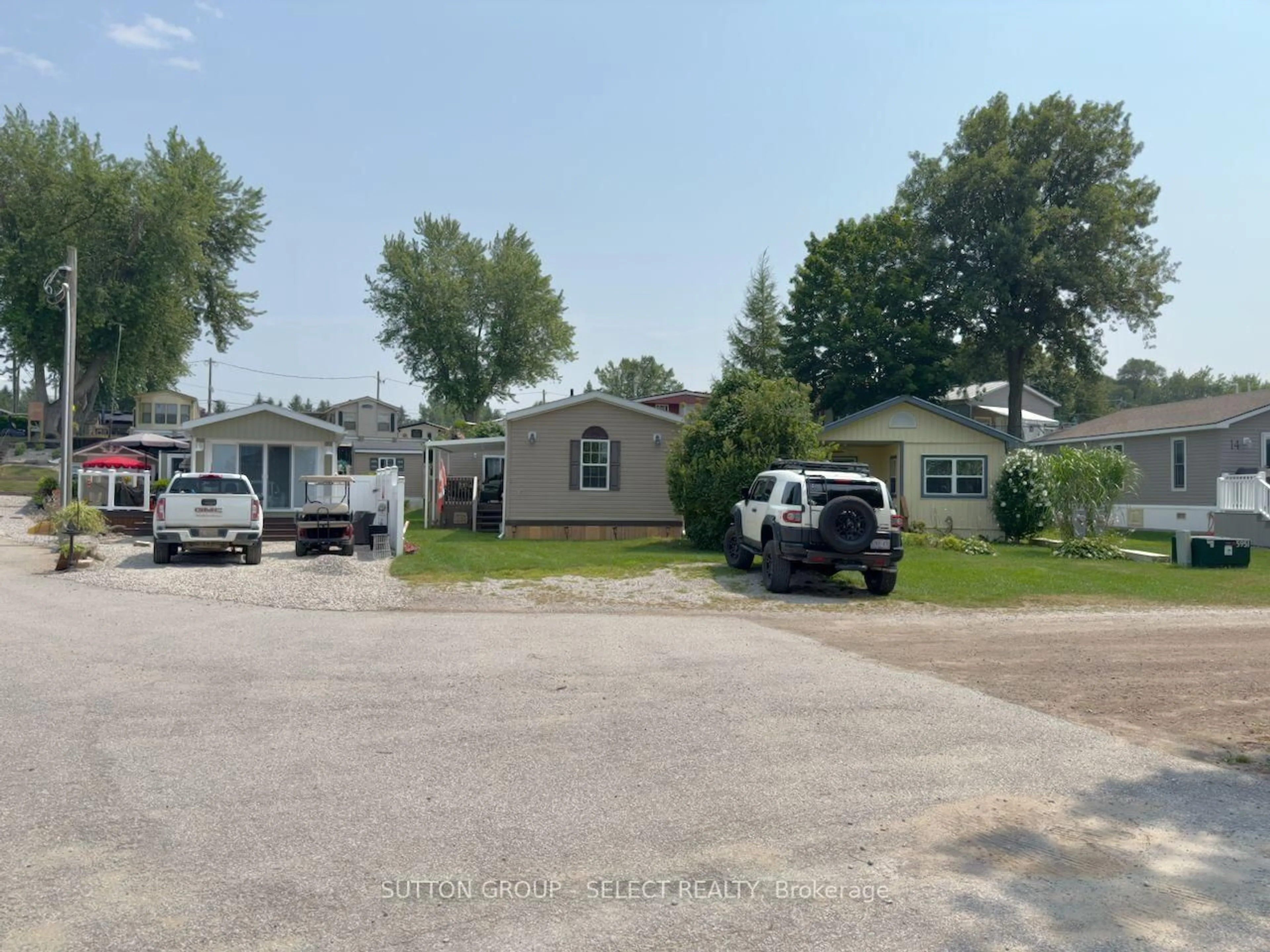 A pic from outside/outdoor area/front of a property/back of a property/a pic from drone, street for 10 CARIBBEAN Lane, Bluewater Ontario N0M 1N0