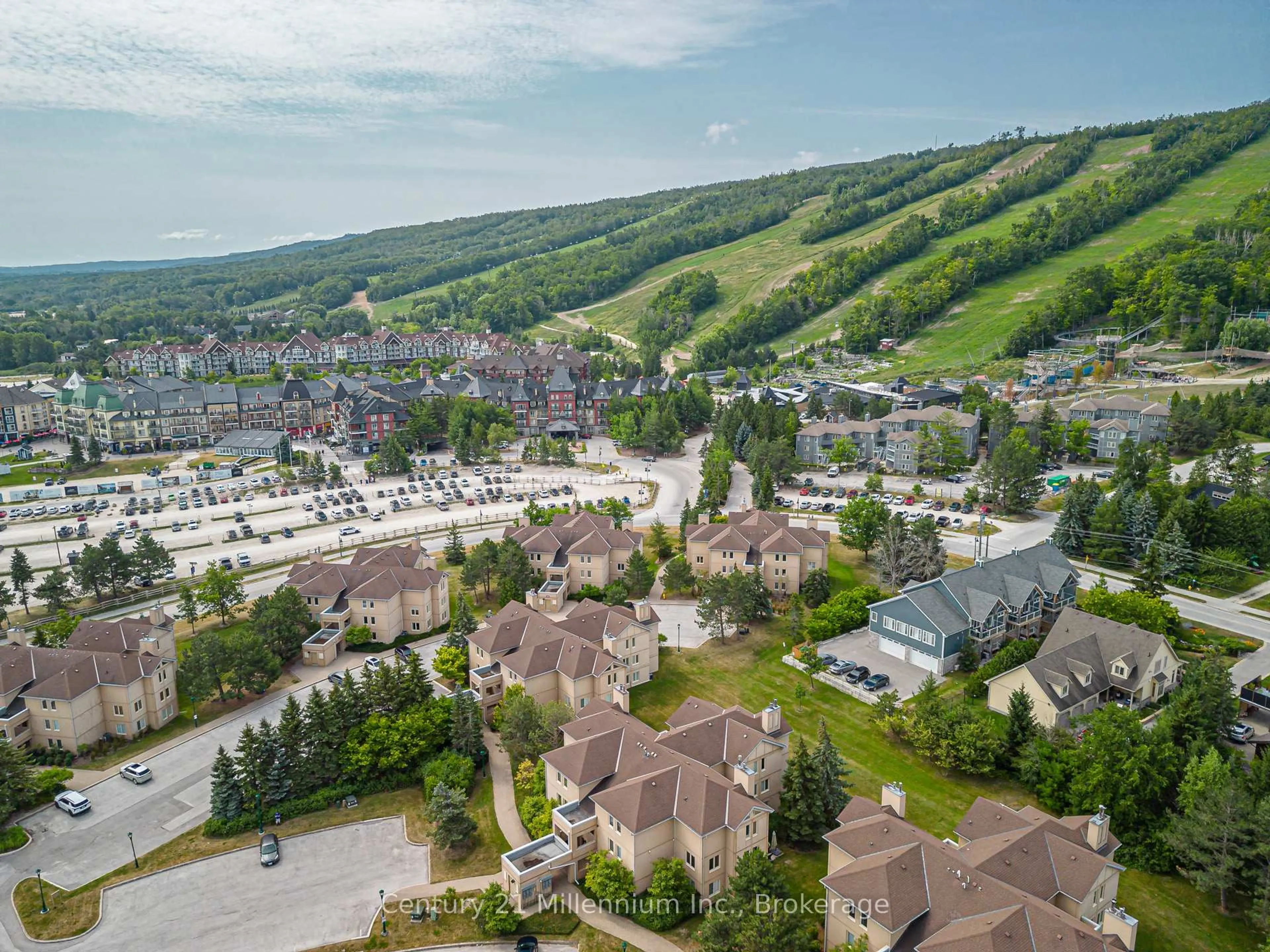 A pic from outside/outdoor area/front of a property/back of a property/a pic from drone, mountain view for 169 Jozo Weider Blvd #118, Blue Mountains Ontario L9Y 0V2