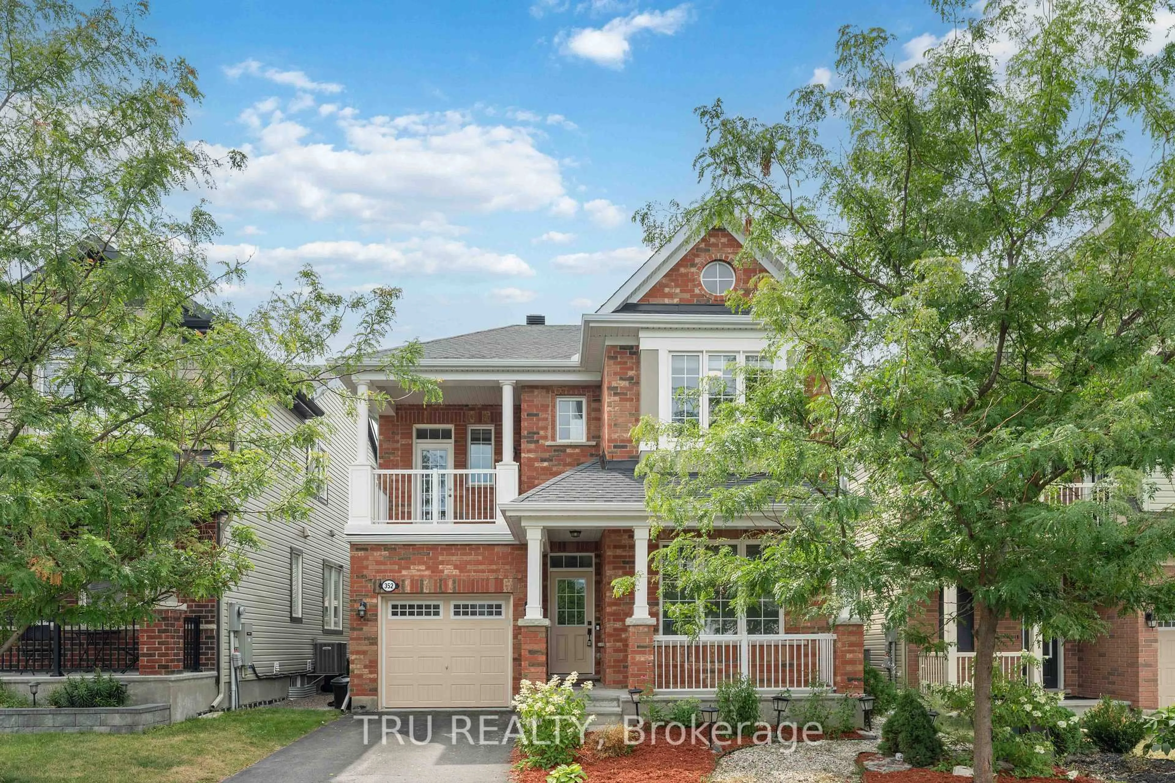 Home with brick exterior material, street for 352 Meadowbreeze Dr, Ottawa Ontario K2M 0K3