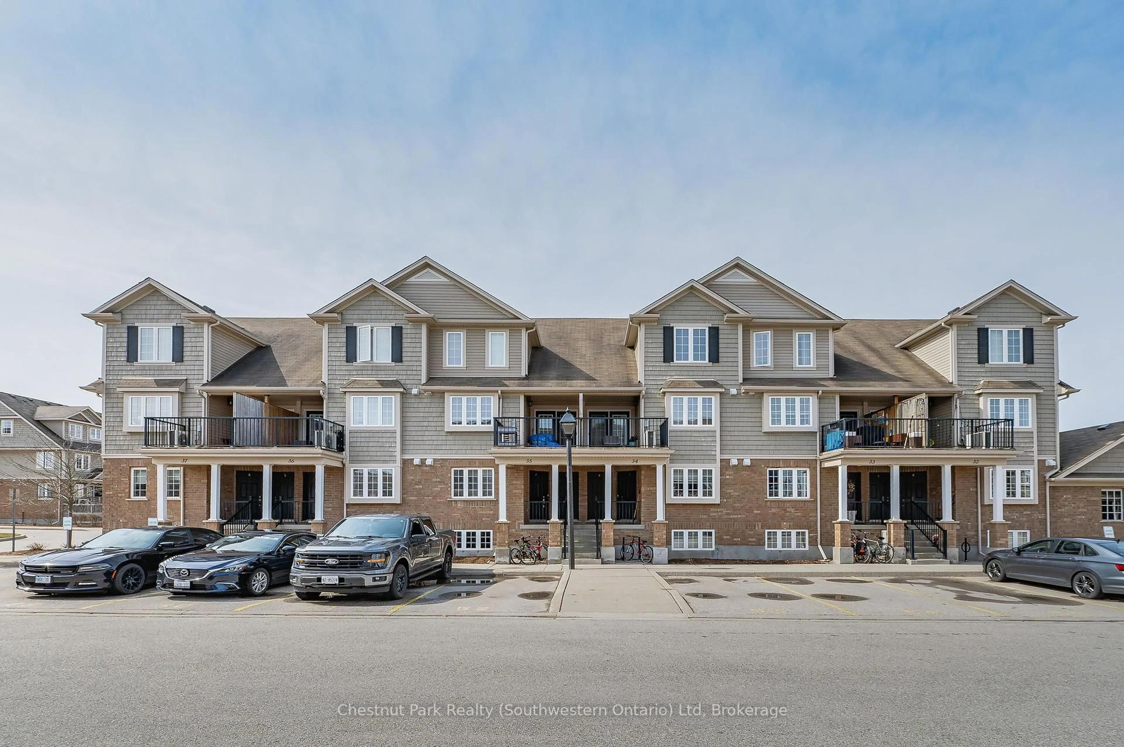 A pic from outside/outdoor area/front of a property/back of a property/a pic from drone, unknown for 15 Carere Cres #35A, Guelph Ontario N1E 0K4