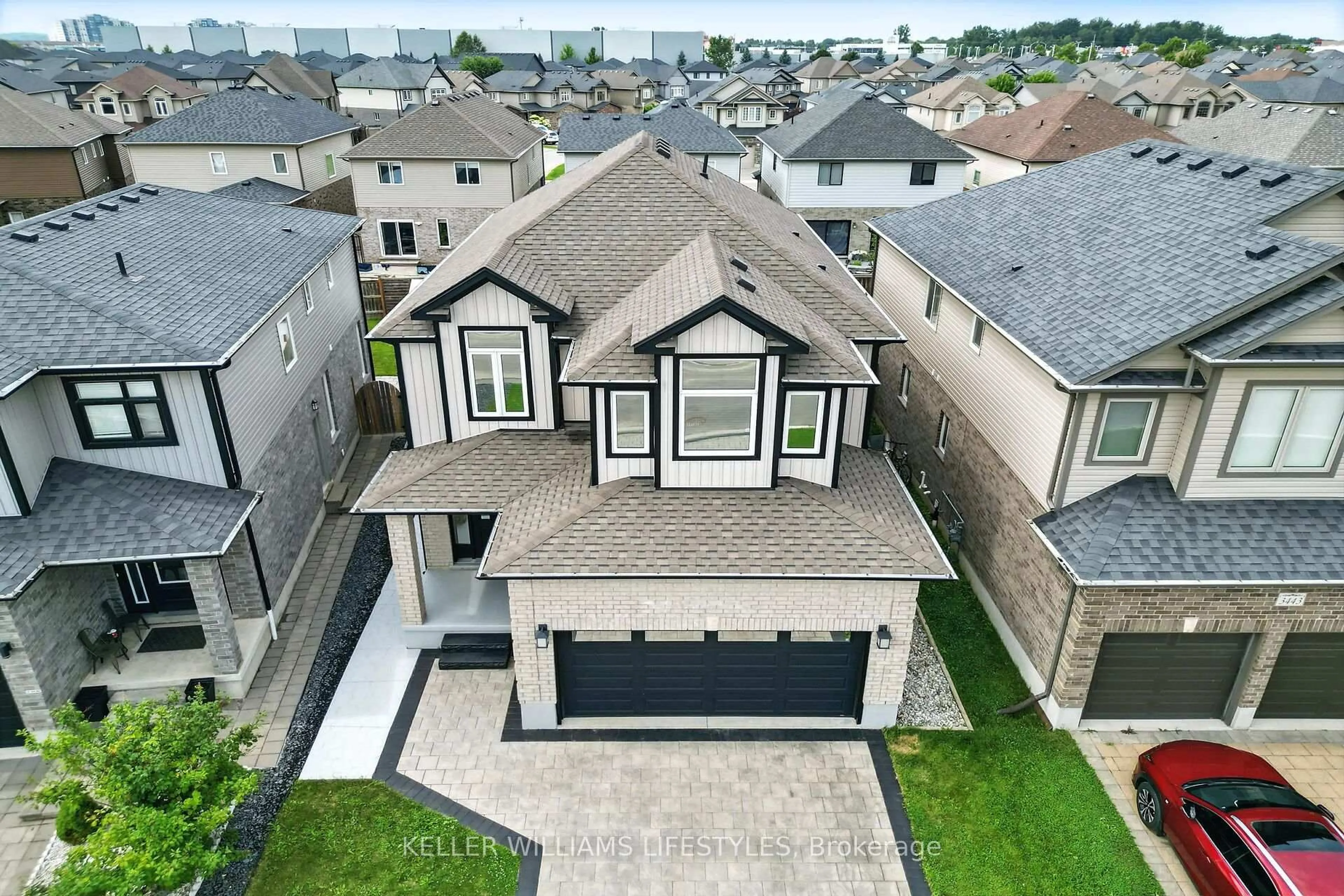 A pic from outside/outdoor area/front of a property/back of a property/a pic from drone, street for 3447 Georgeheriot Lane, London South Ontario N6L 0A5