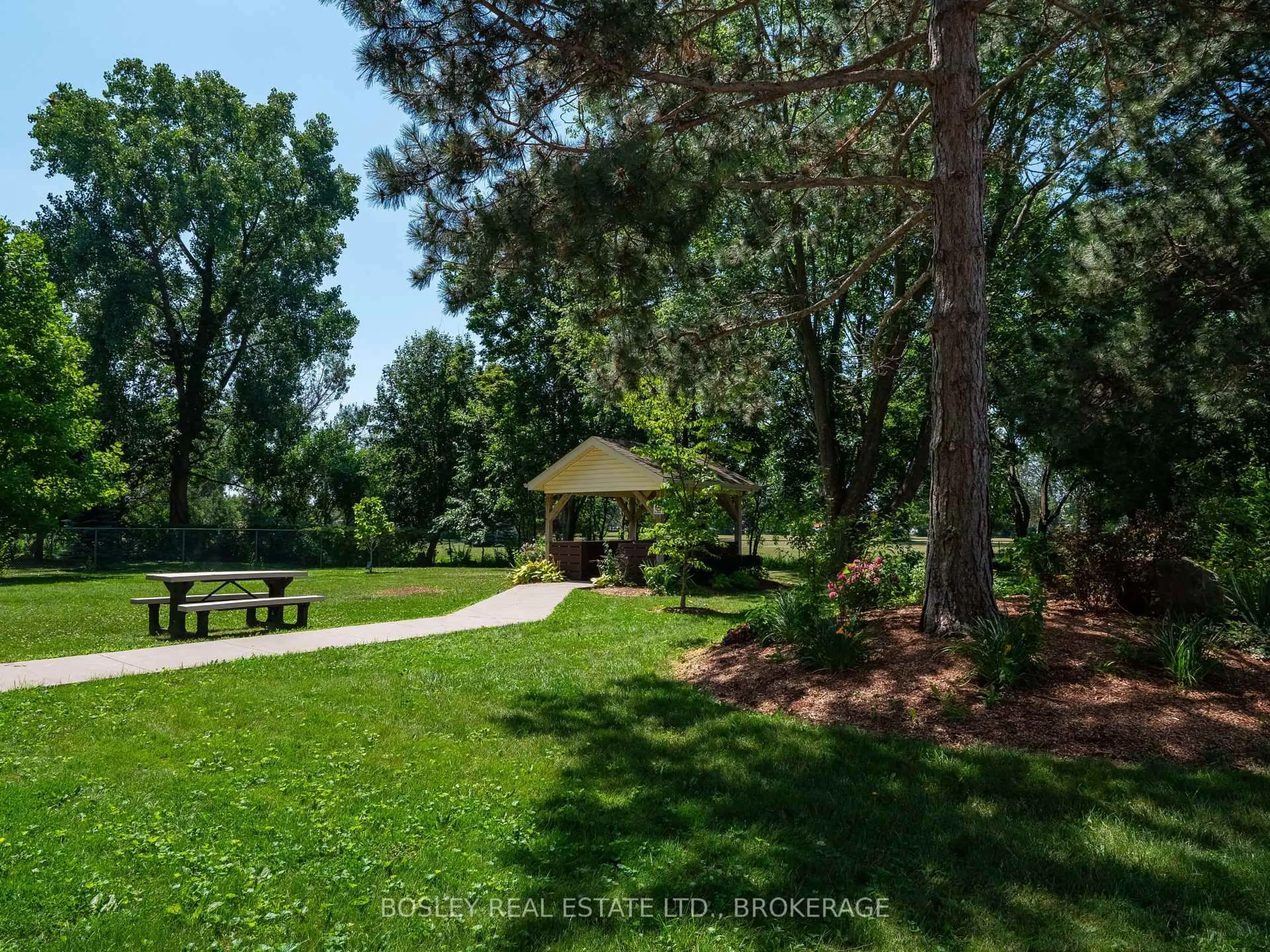 A pic from outside/outdoor area/front of a property/back of a property/a pic from drone, forest/trees view for 365 Geneva St #409, St. Catharines Ontario L2N 5S7