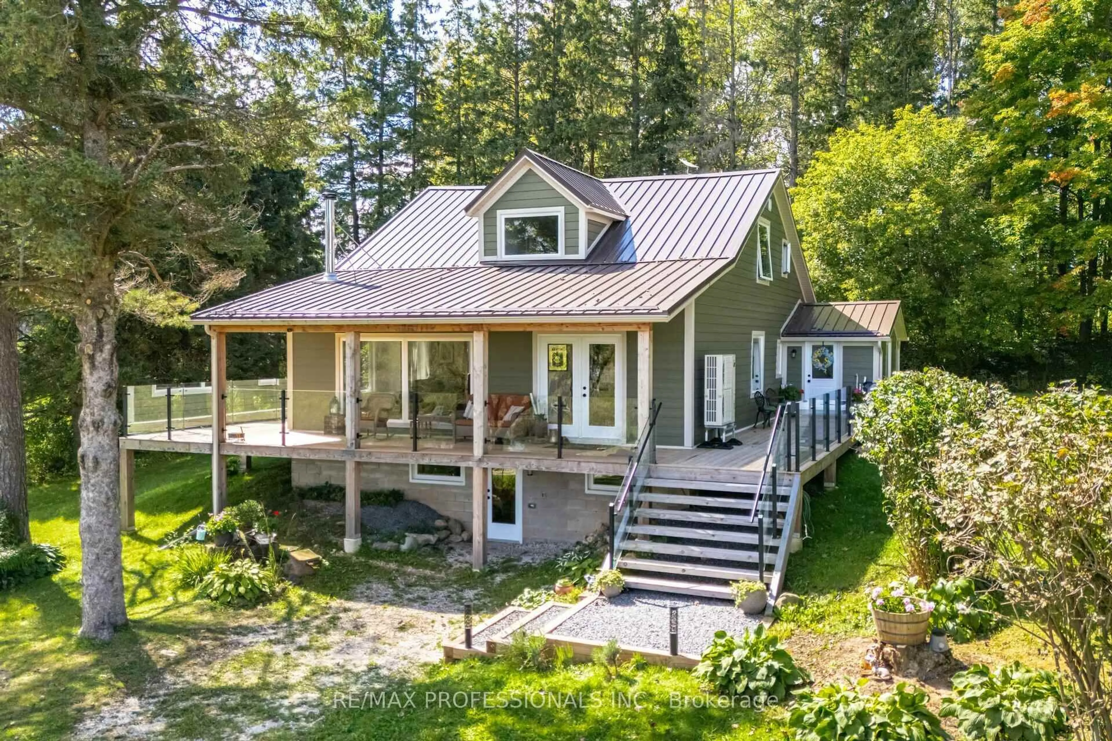 A pic from outside/outdoor area/front of a property/back of a property/a pic from drone, unknown for 135850 9th Line, Grey Highlands Ontario N0C 1H0