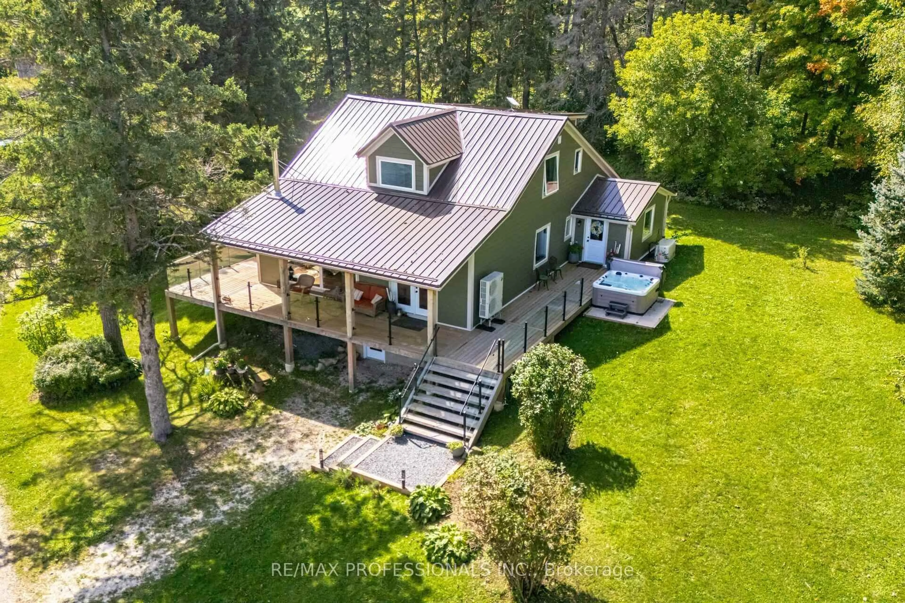 A pic from outside/outdoor area/front of a property/back of a property/a pic from drone, unknown for 135850 9th Line, Grey Highlands Ontario N0C 1H0