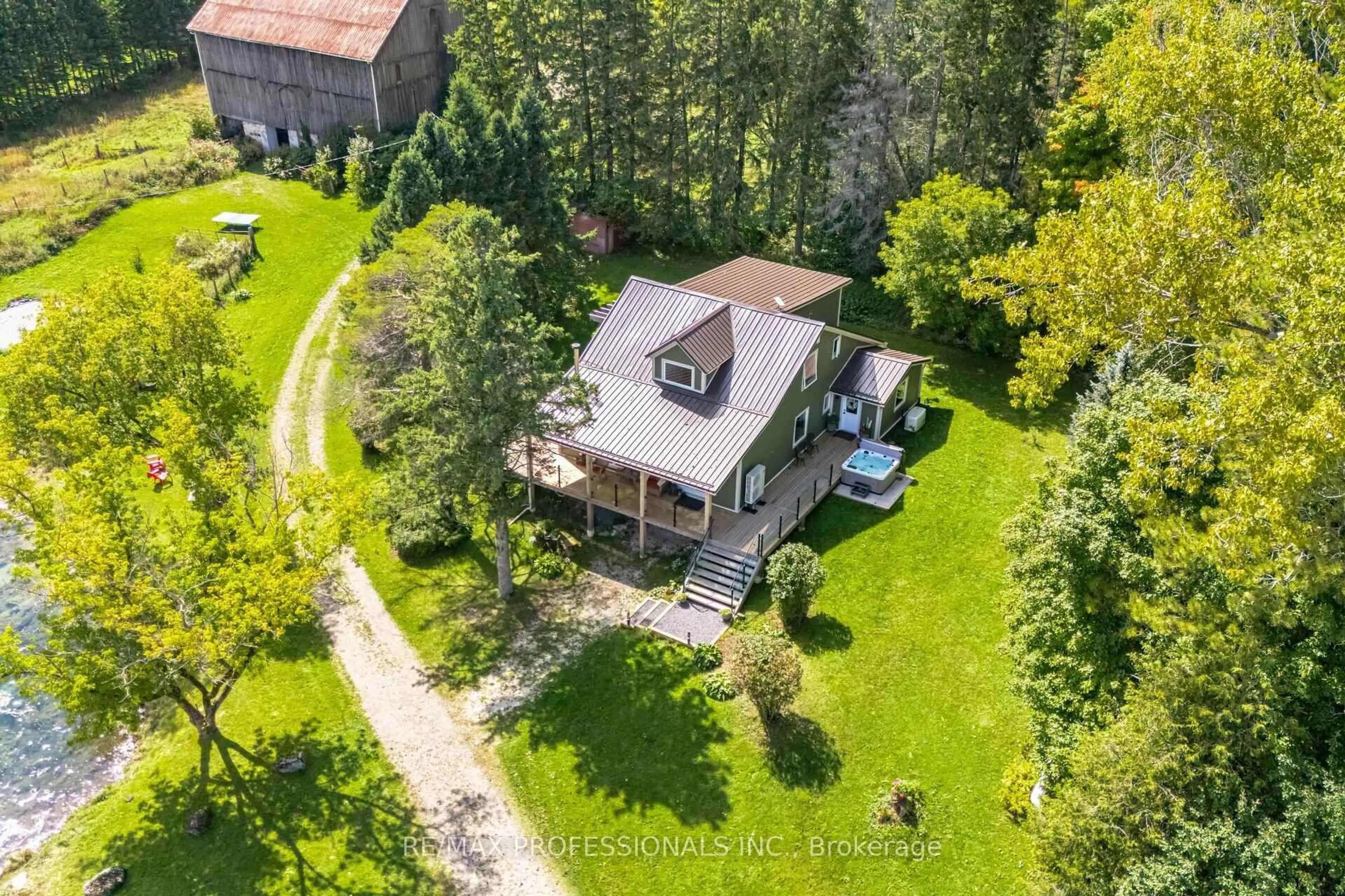 A pic from outside/outdoor area/front of a property/back of a property/a pic from drone, unknown for 135850 9th Line, Grey Highlands Ontario N0C 1H0