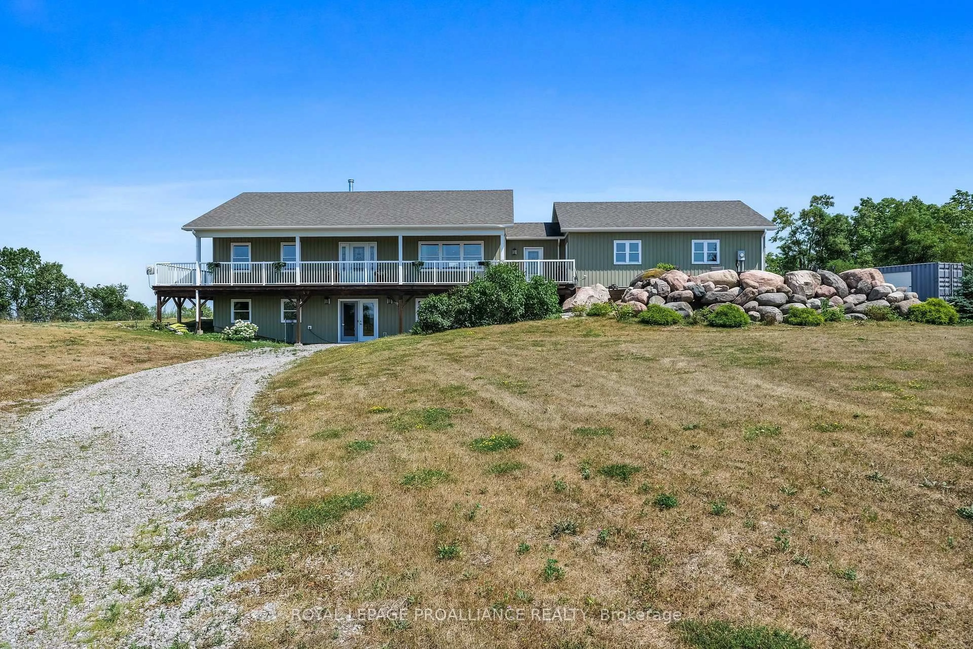 A pic from outside/outdoor area/front of a property/back of a property/a pic from drone, water/lake/river/ocean view for 1526 County Road 2, Otonabee-South Monaghan Ontario K0L 1B0