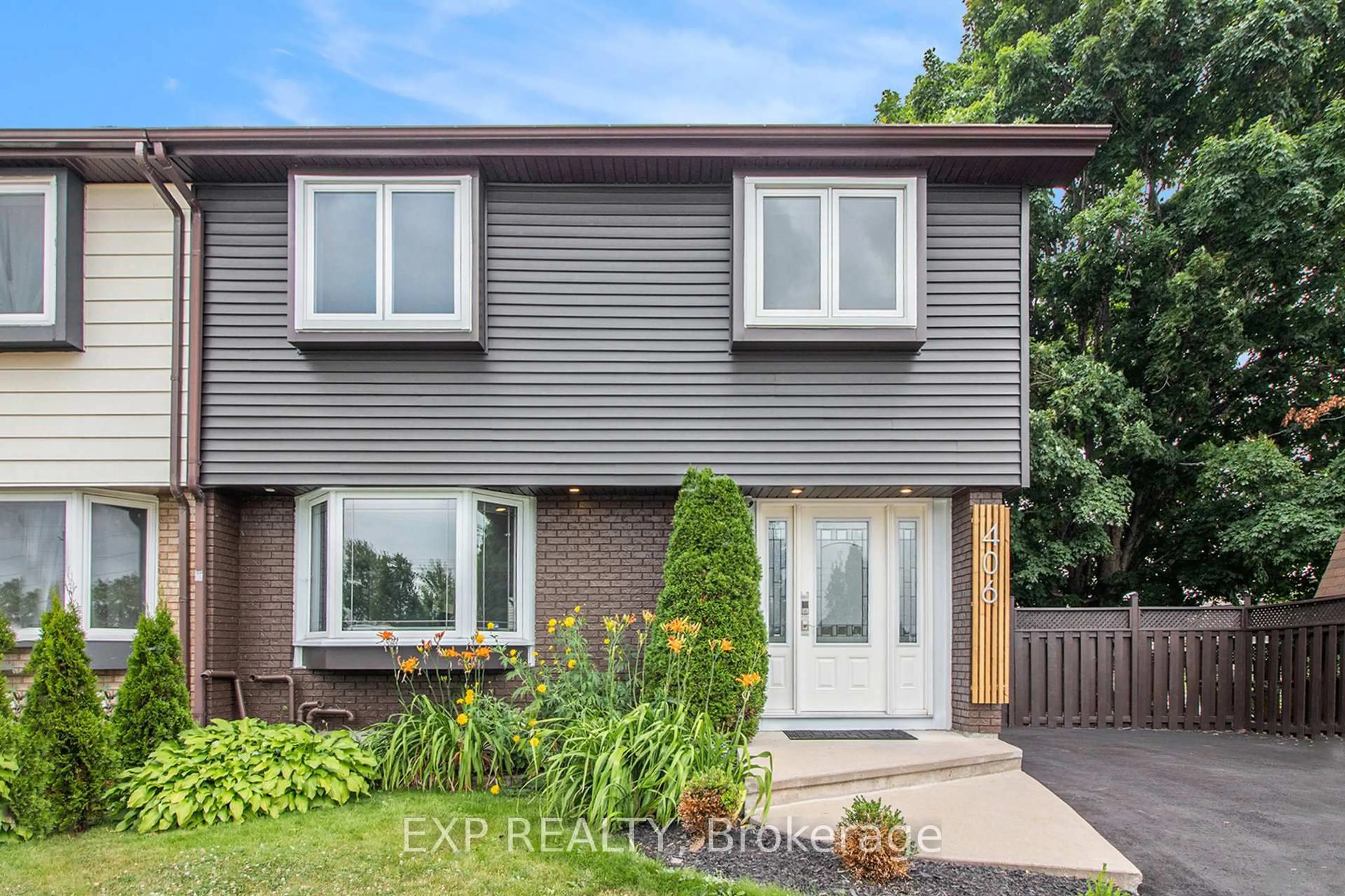 Home with brick exterior material, street for 406 WOODFIELD Dr, Ottawa Ontario K2G 3W9