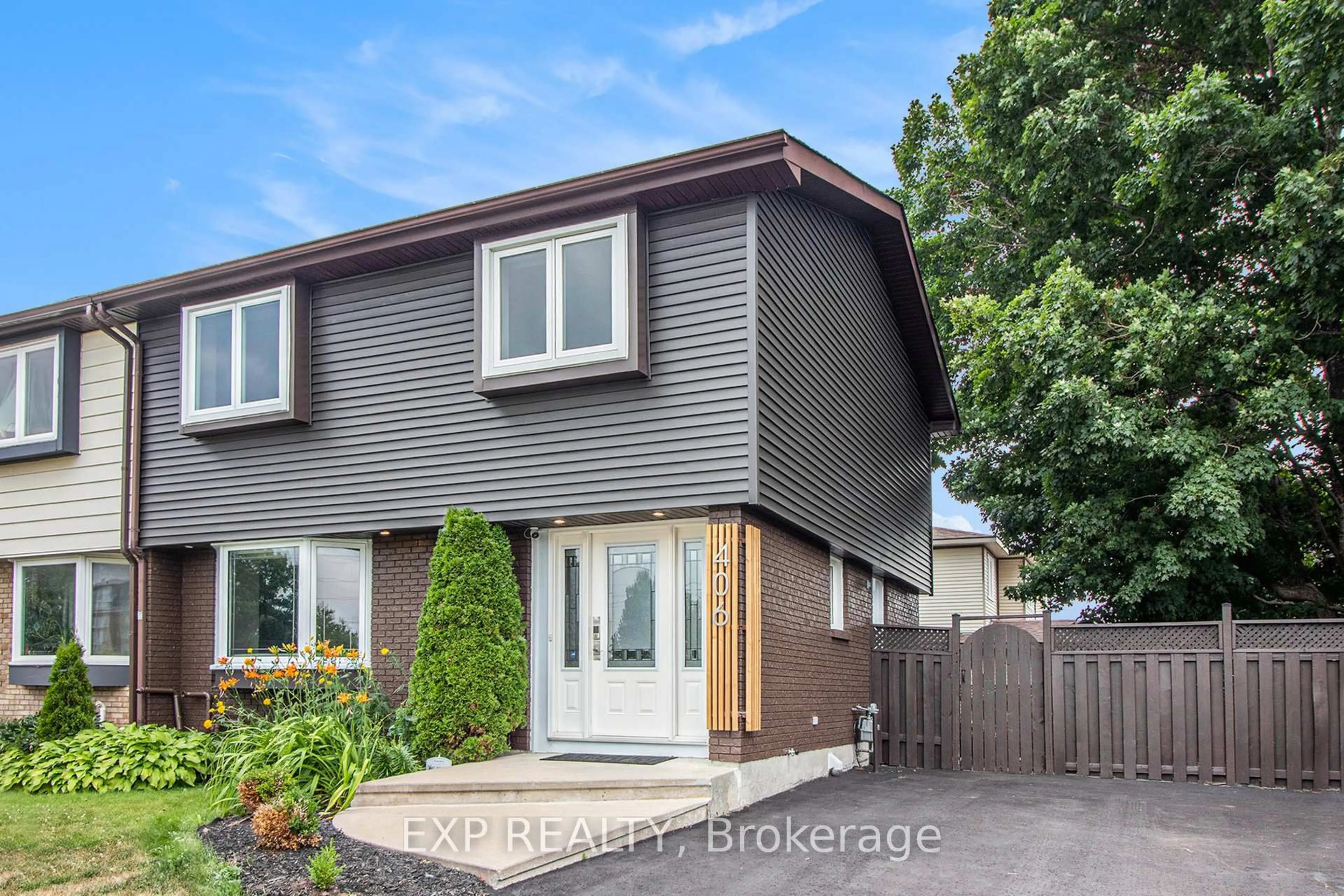 Home with vinyl exterior material, street for 406 WOODFIELD Dr, Ottawa Ontario K2G 3W9