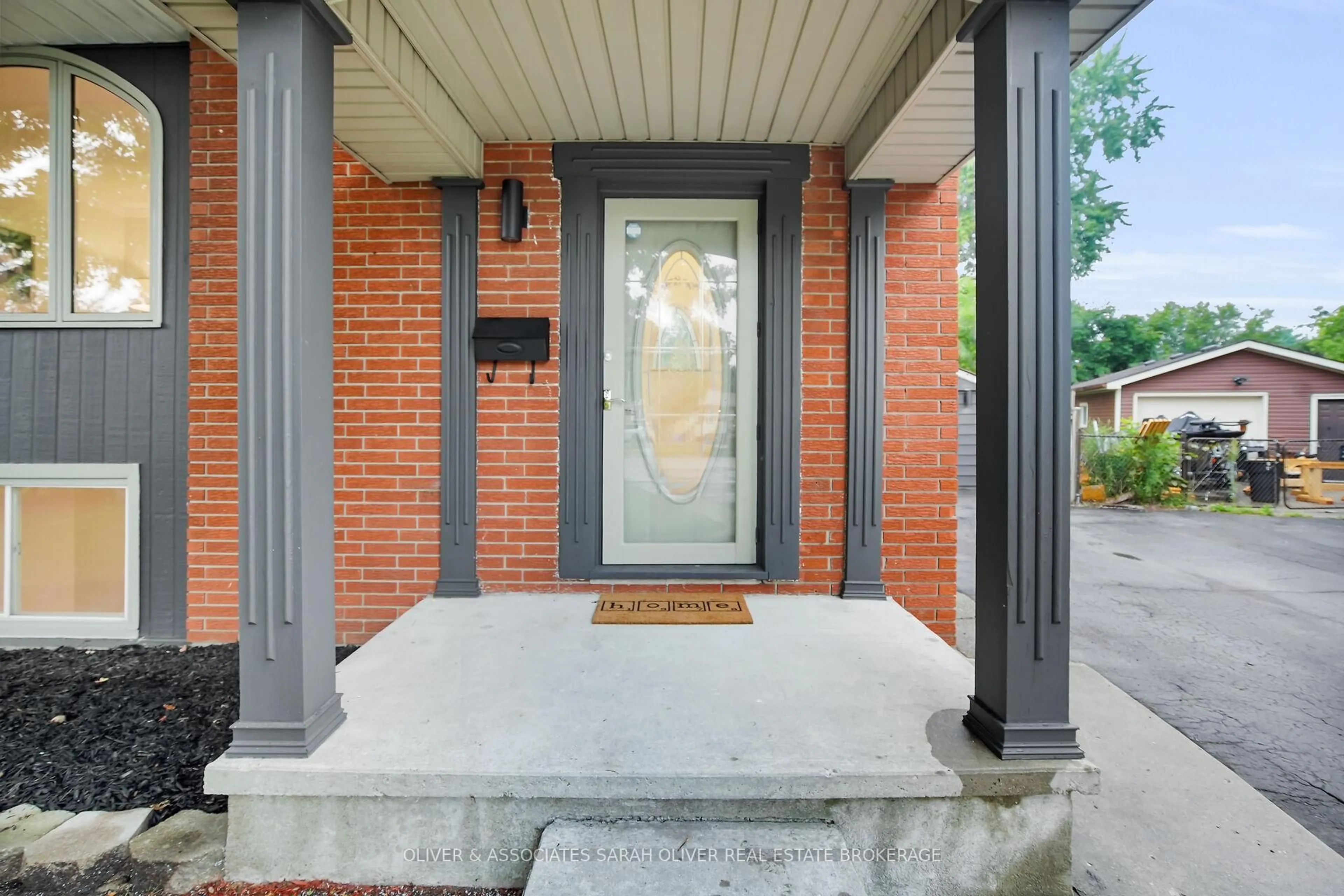 Home with brick exterior material, street for 15 Kenwood Cres, London East Ontario N5Y 3W6