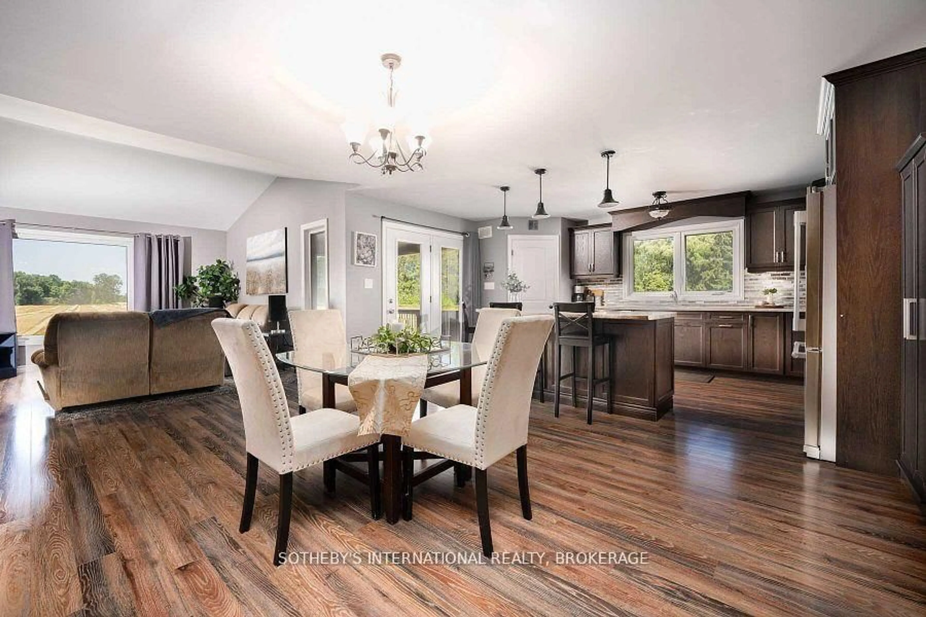 Open concept kitchen, wood/laminate floor for 917 Wainfleet Dunnville Townline Rd, Wainfleet Ontario N0A 1K0