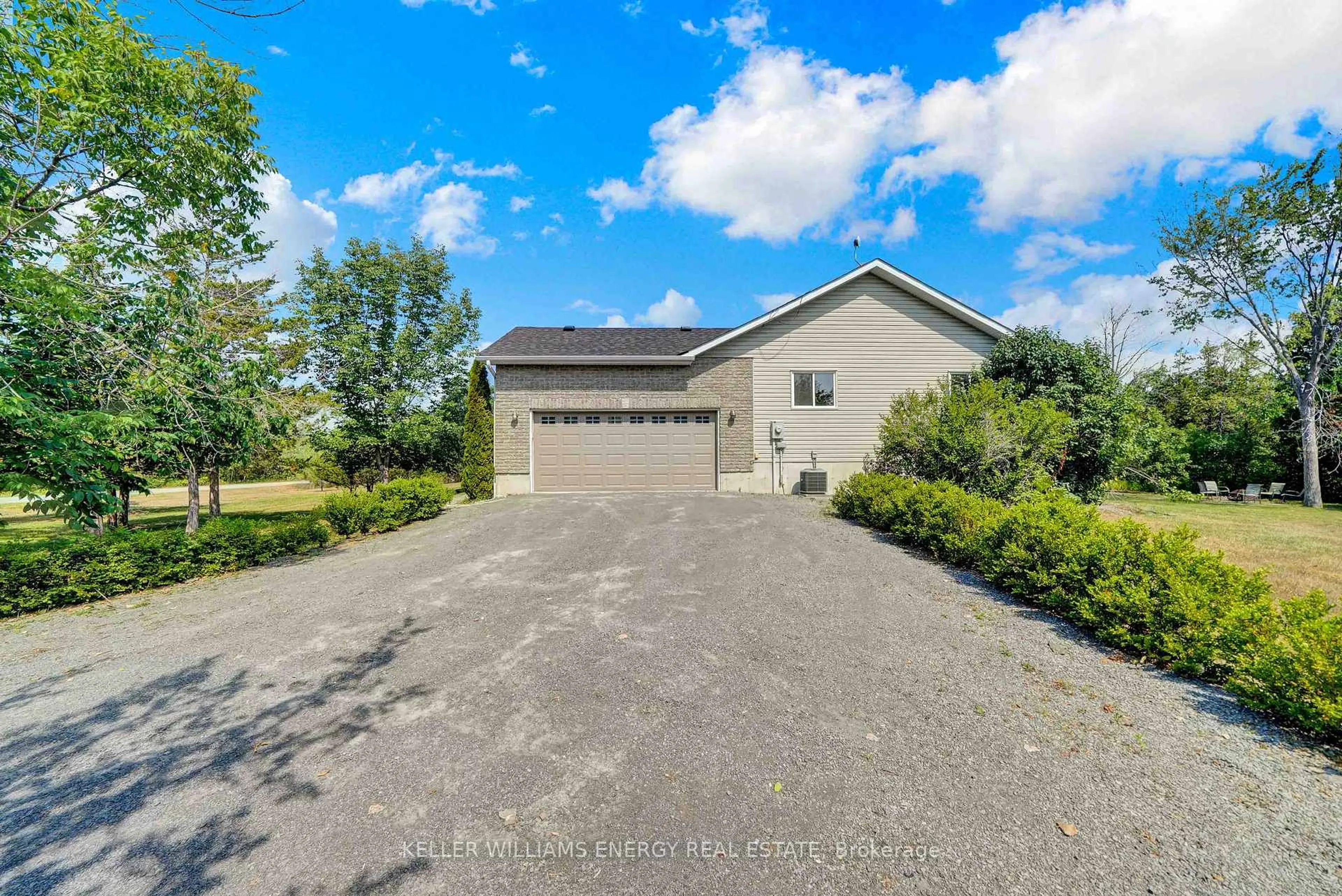 A pic from outside/outdoor area/front of a property/back of a property/a pic from drone, water/lake/river/ocean view for 118 Foster Rd, Prince Edward County Ontario K0K 1W0