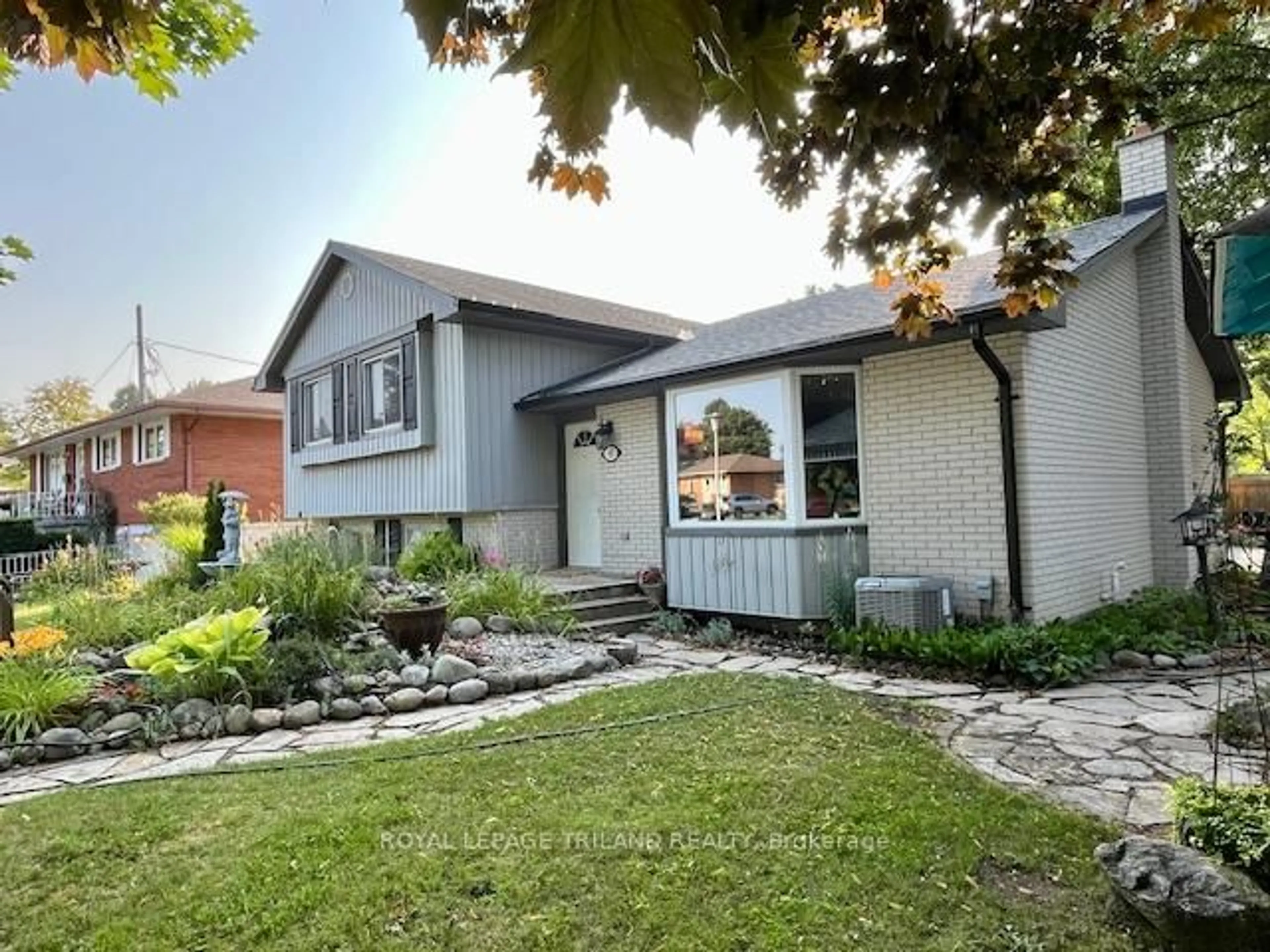 Home with vinyl exterior material, street for 65 Almond Rd, London South Ontario N5Z 4C7