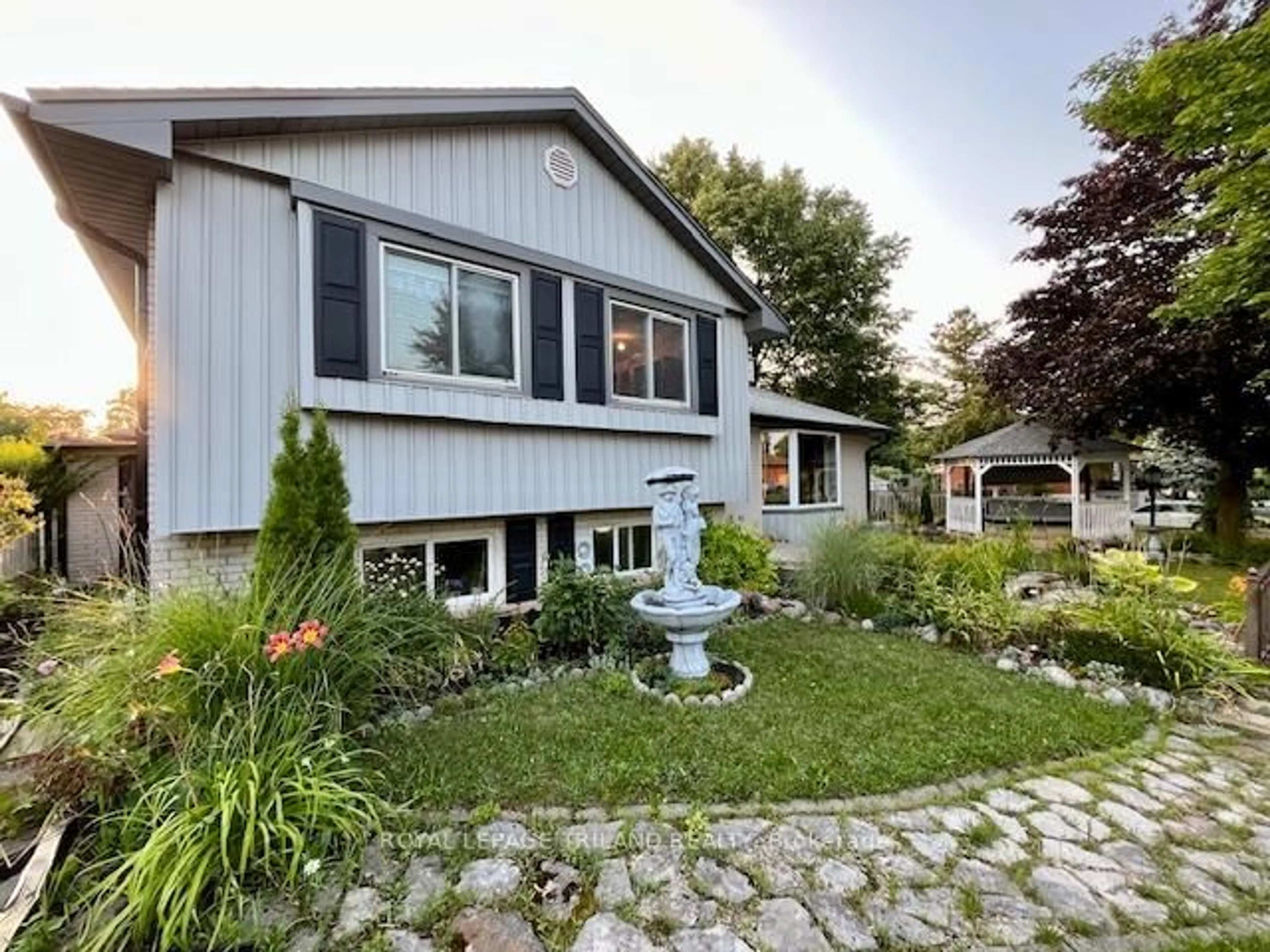 Home with vinyl exterior material, street for 65 Almond Rd, London South Ontario N5Z 4C7