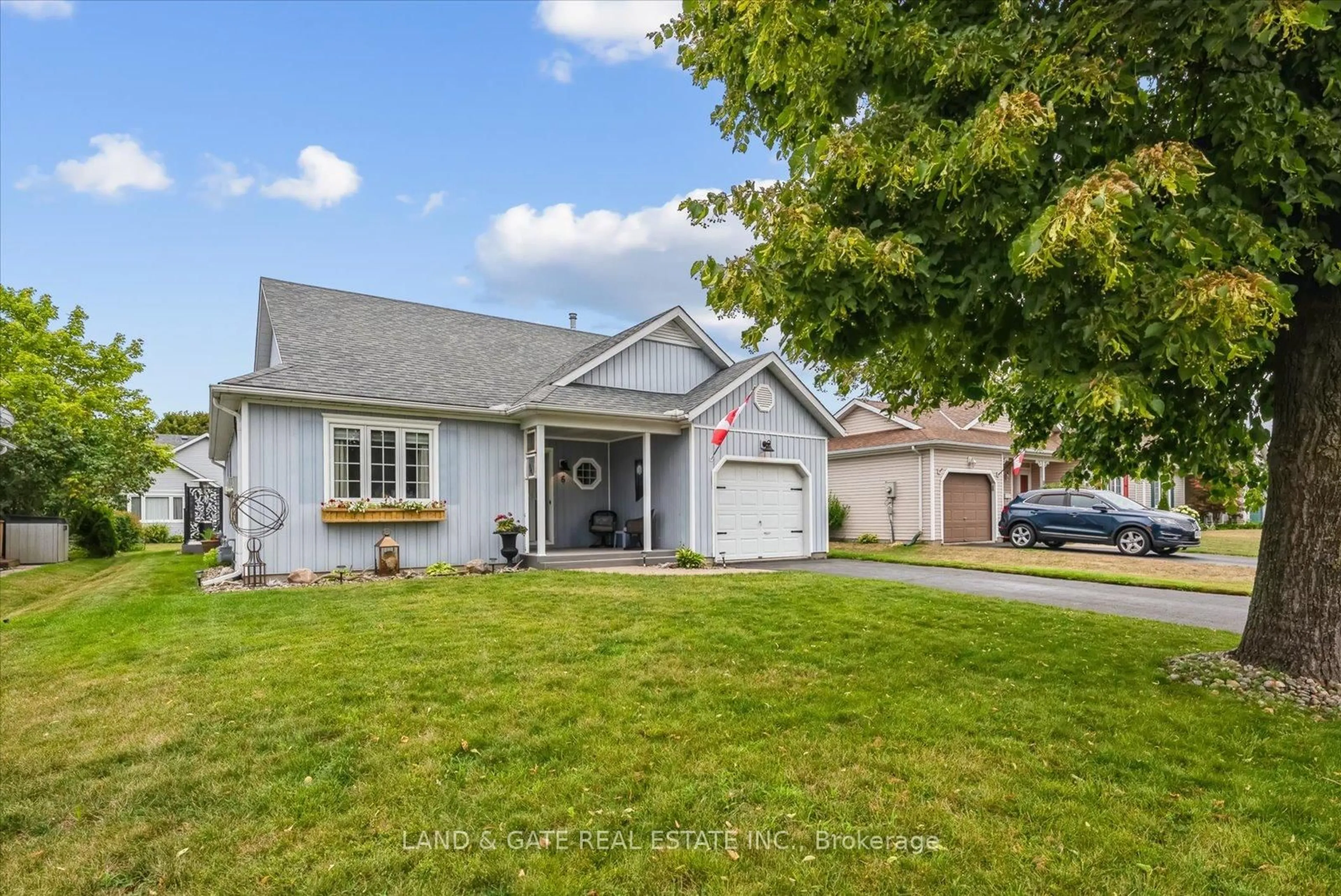 Home with vinyl exterior material, street for 6 Nesbitt Dr, Brighton Ontario K0K 1H0