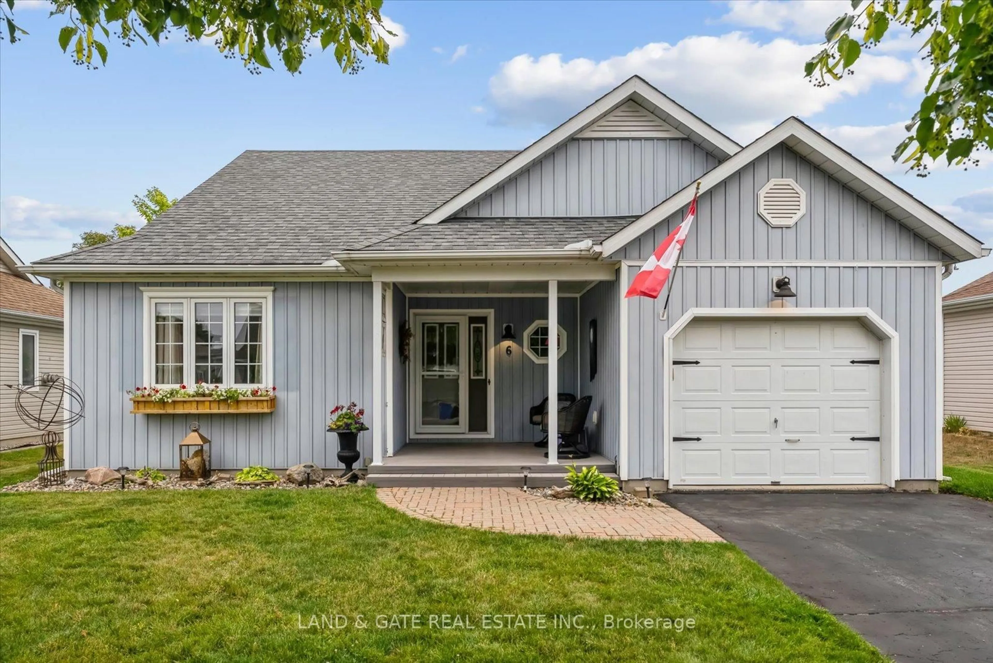 Home with vinyl exterior material, street for 6 Nesbitt Dr, Brighton Ontario K0K 1H0