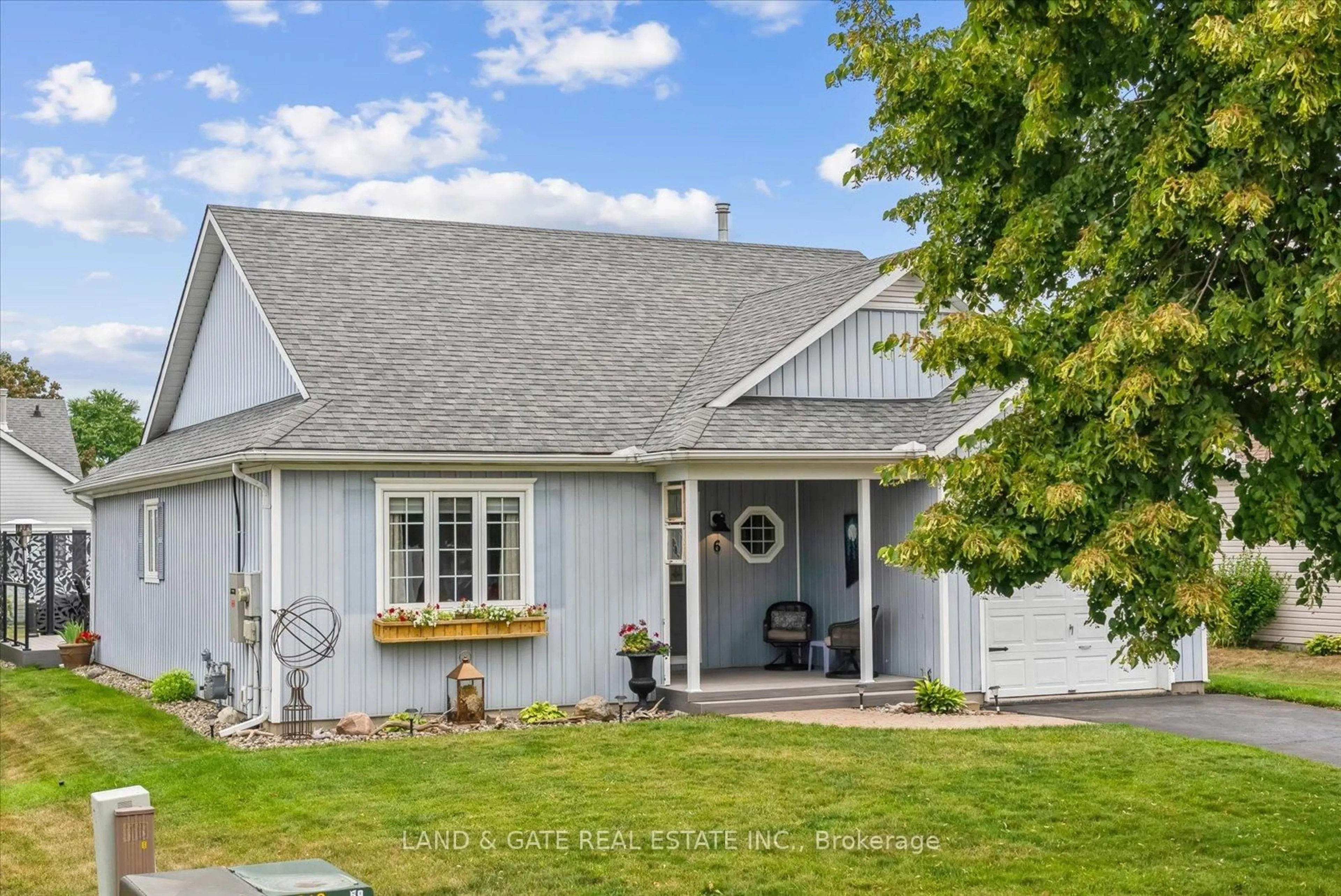 Home with vinyl exterior material, street for 6 Nesbitt Dr, Brighton Ontario K0K 1H0