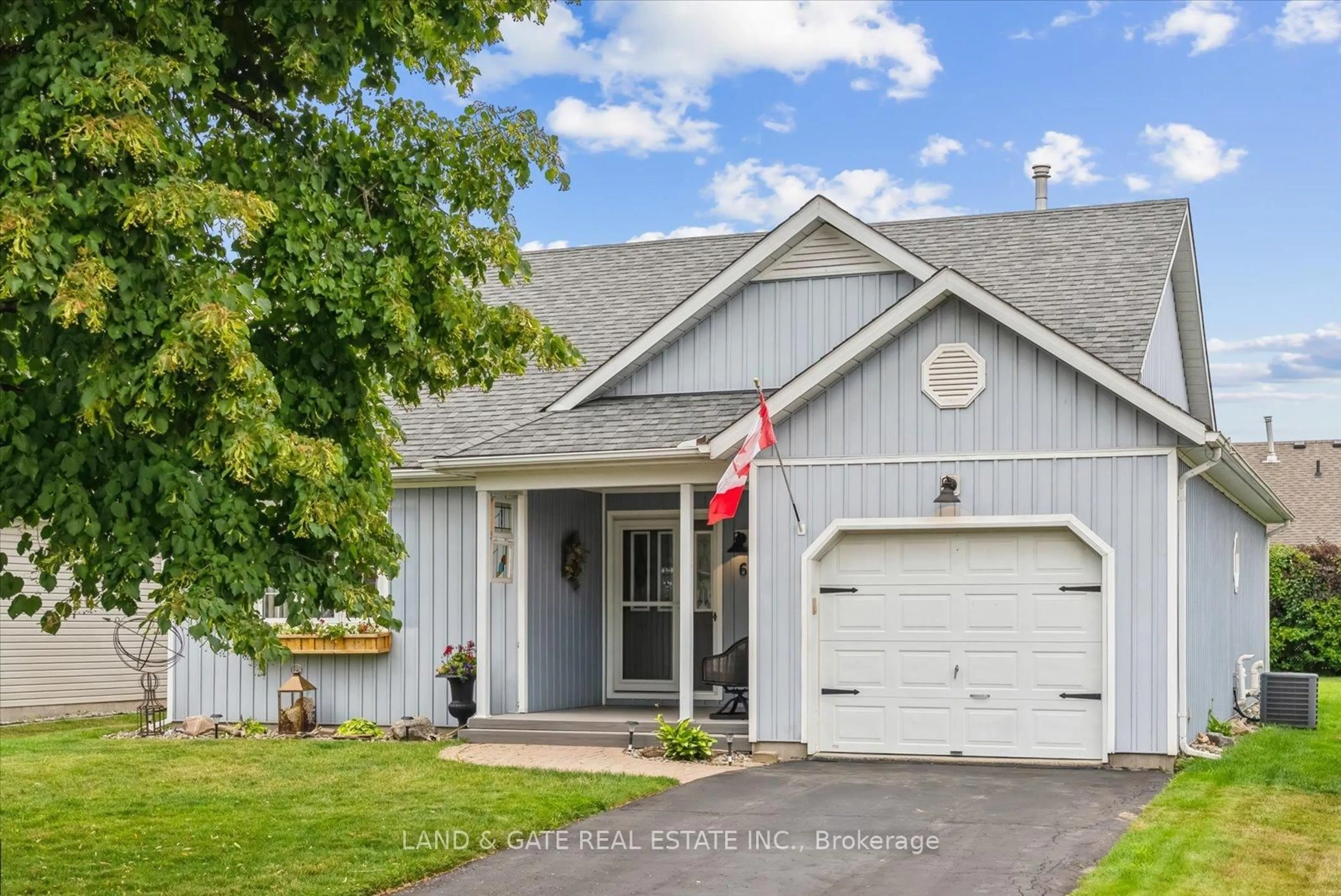 Home with vinyl exterior material, street for 6 Nesbitt Dr, Brighton Ontario K0K 1H0