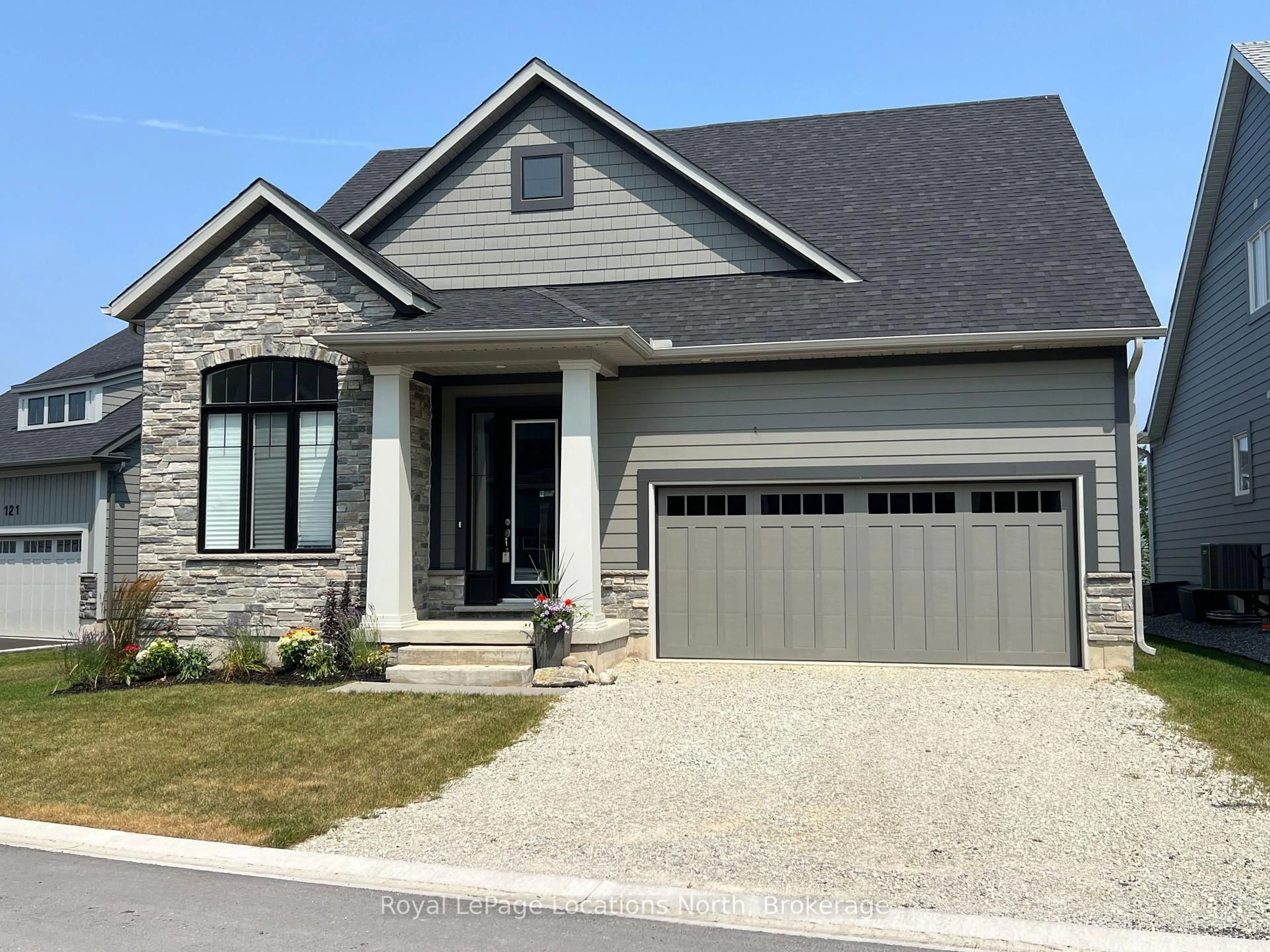 Home with brick exterior material, street for 123 Beacon Dr, Blue Mountains Ontario N0H 2P0