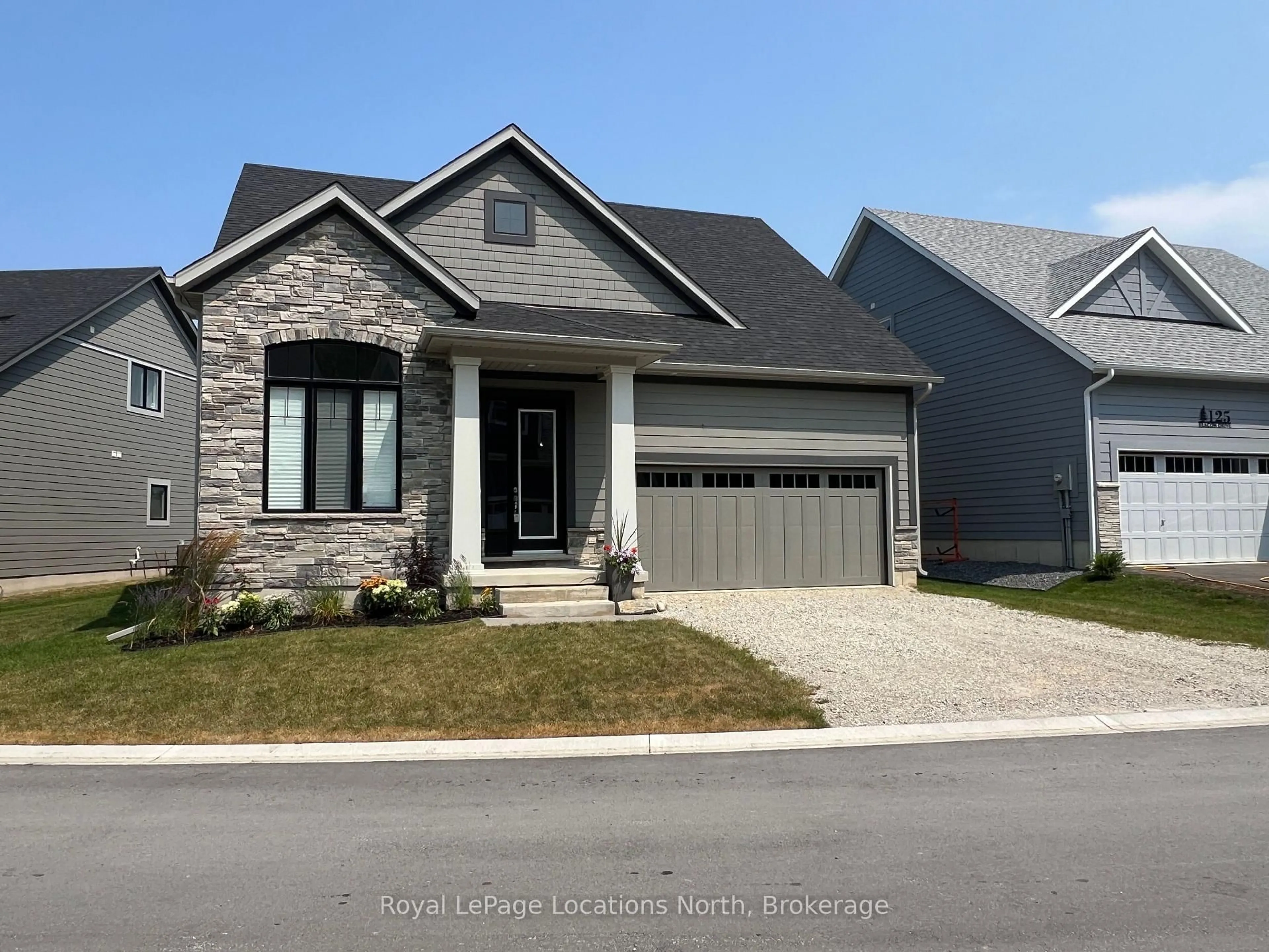 Home with brick exterior material, street for 123 Beacon Dr, Blue Mountains Ontario N0H 2P0